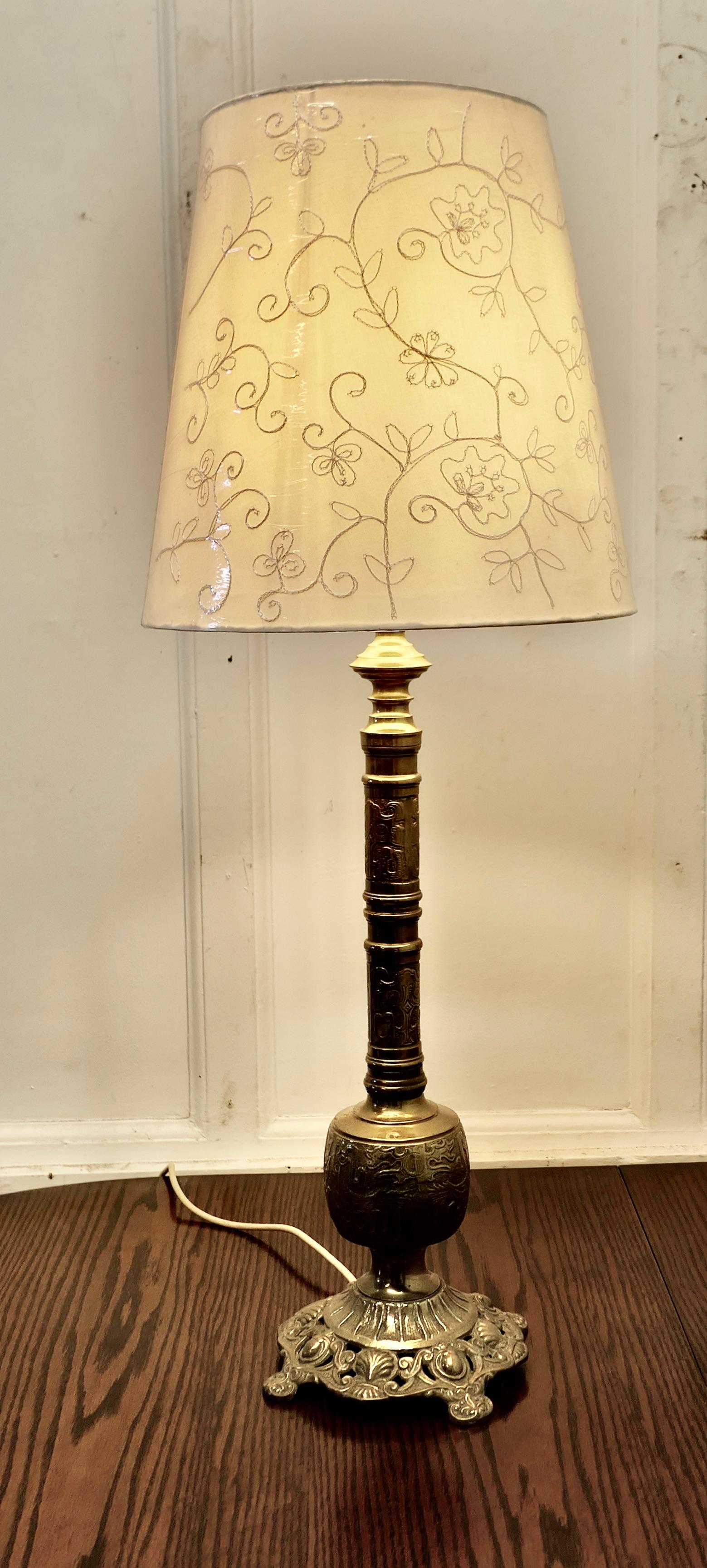 Tall Embossed Brass Table Lamp


This is a good quality brass piece, it has a single tall column set on a gothic style Round decorative base 

This is a very attractive lamp with a good patina, it is in good condition and has a new embroidered