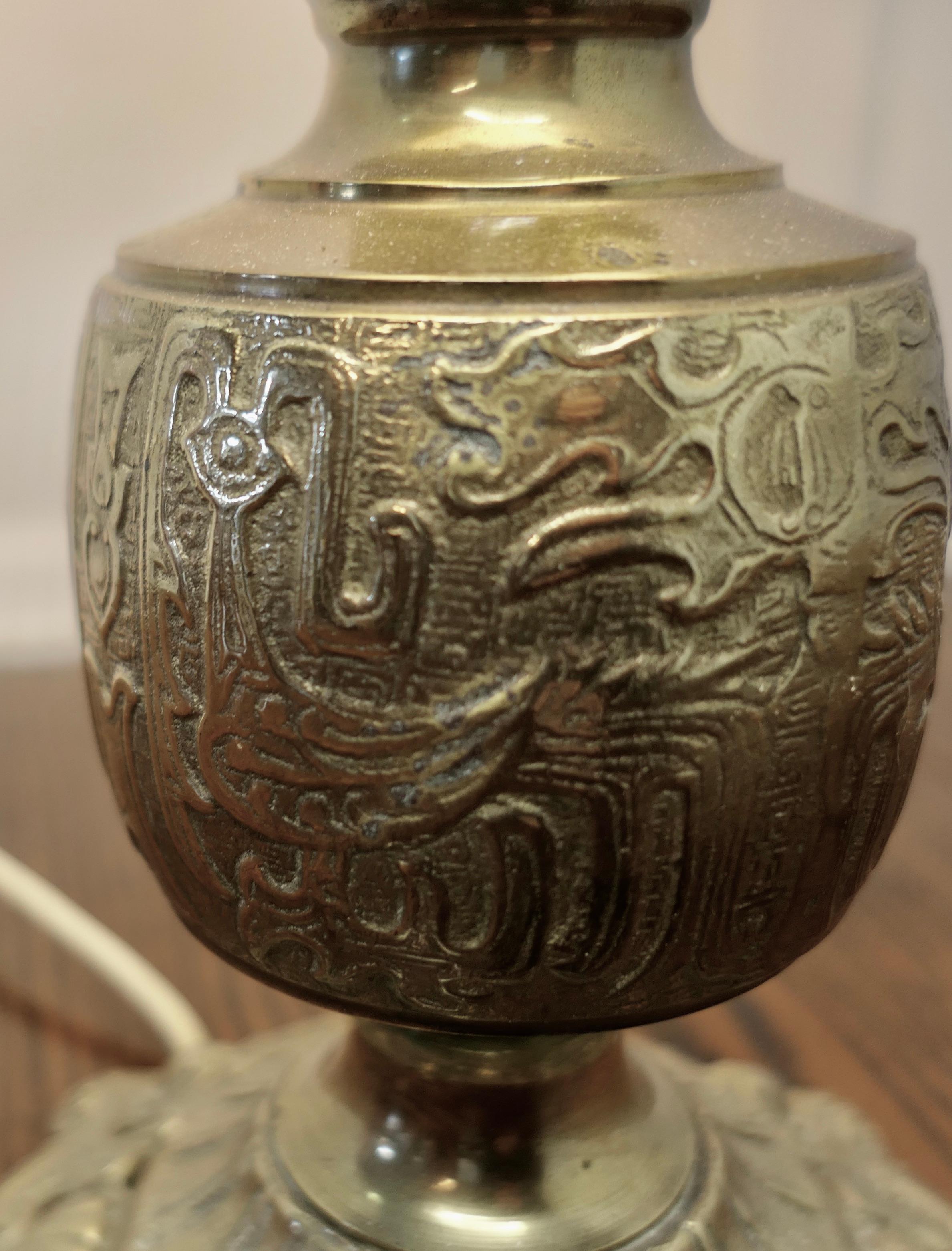 Early 20th Century Tall Embossed Brass Table Lamp For Sale