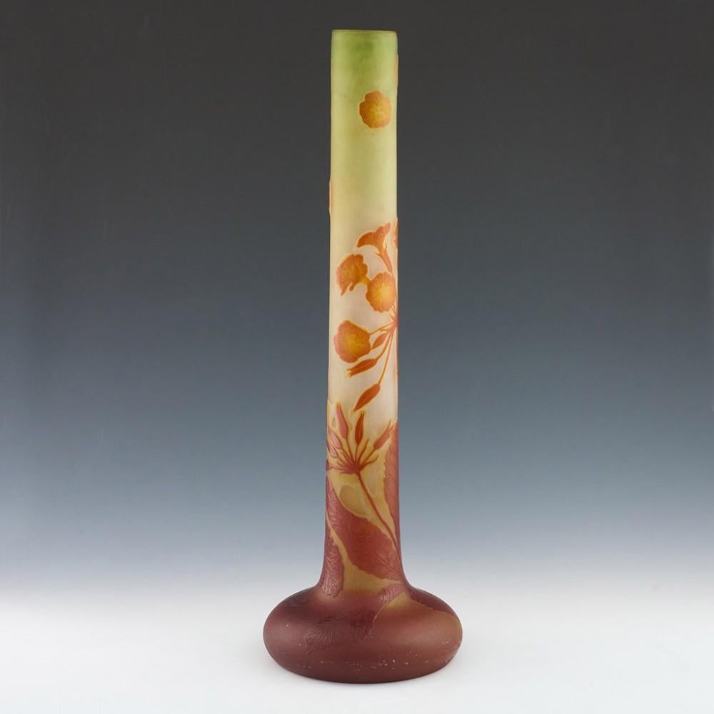 Heading : Large Emile Galle cameo glass vase
Date : c1910
Origin : Nancy, France
Bowl Features : Pale graduating to burnt orange over lime green graduating to nearly clear cameo glass depicting flowers
Marks : Signed Galle - the version of the