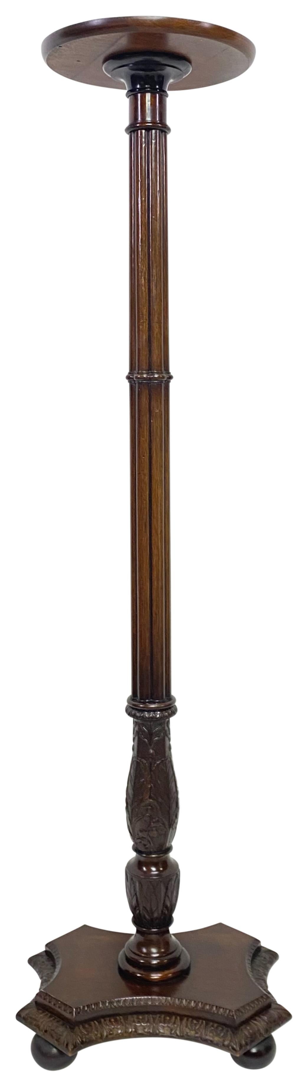 A tall Georgian period carved mahogany torchere fern stand.
Solid mahogany of quality craftsmanship. Stands sturdy and displays beautifully.
England, late 19th / early 19th century


