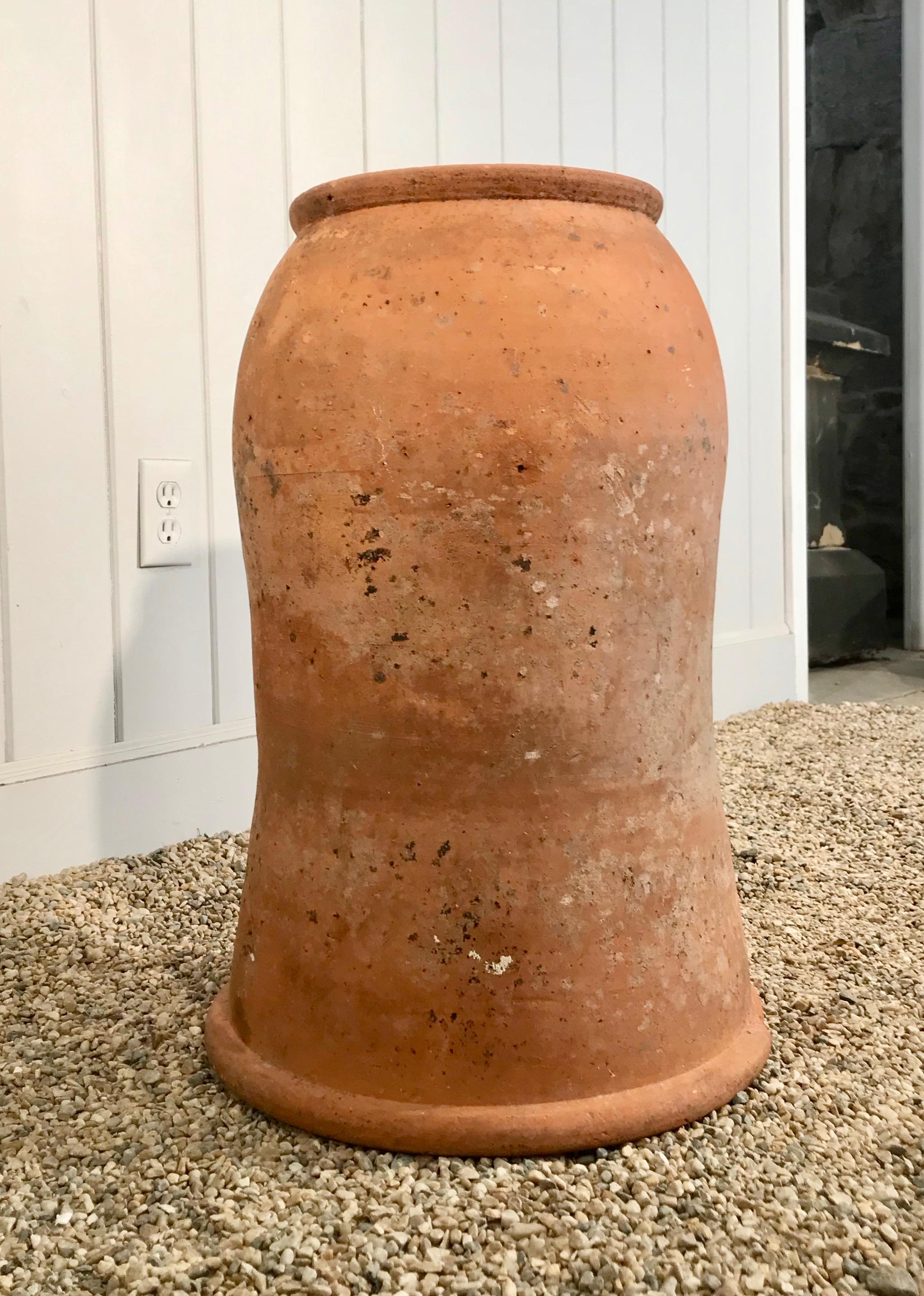 We love old English forcing pots and have three beauties, of which this is the largest. With a lovely scrolled neck and rim, and in very good condition (there is a minor rim chip, but no cracks), it would be lovely in a potager to protect your new