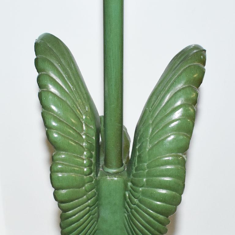 A beautiful federal-style cast metal green eagle lamp. This tall lamp will be a great accent to any nightstand, occasional table, or entryway. Cast in metal in a beautiful olive green, it features gold accents on the base and the body just under the