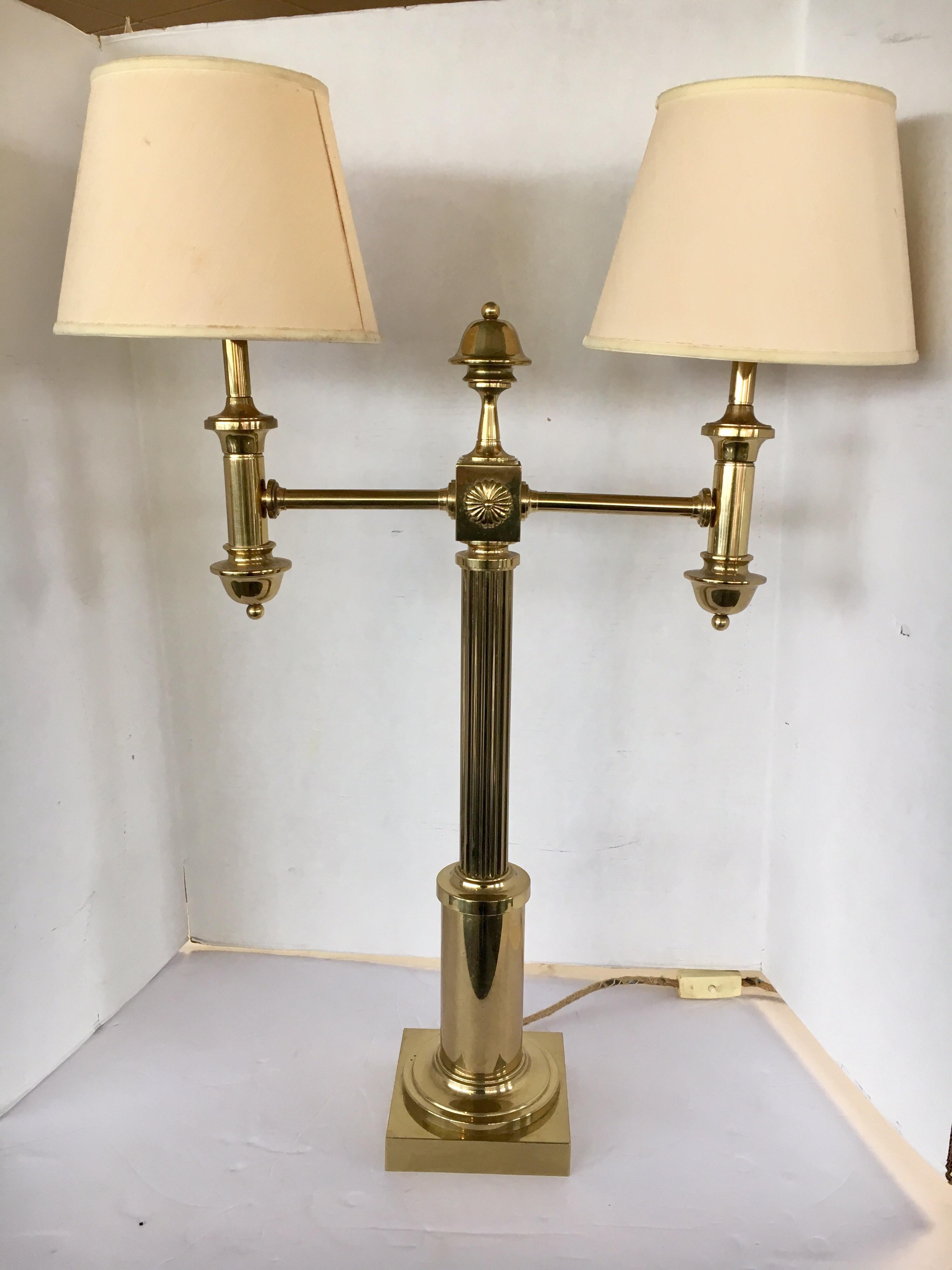 Elegant and tall two-arm brass table lamp that looks like it belongs in the White House. Wired for US and in perfect working condition.