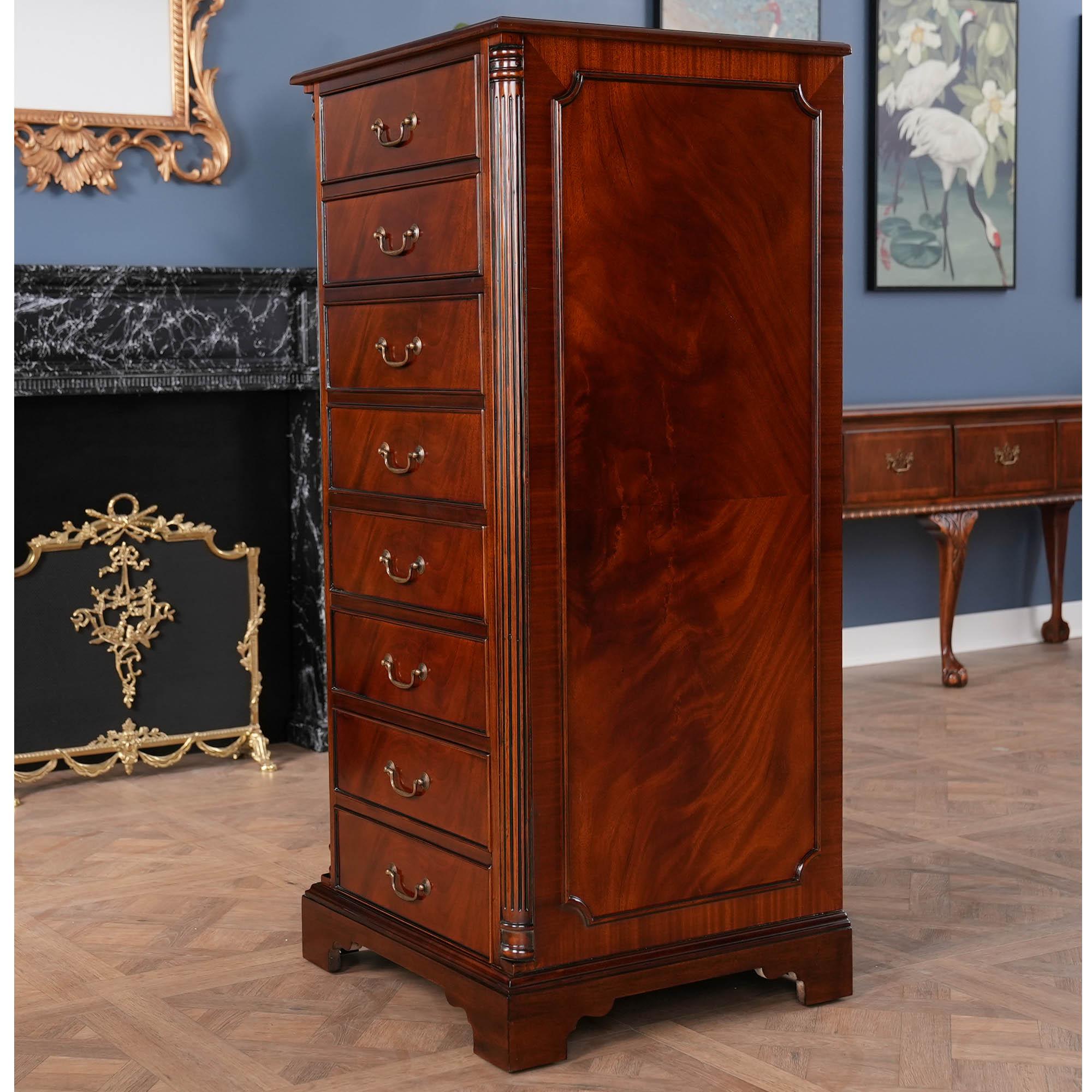 A superb piece of craftsmanship this high quality Mahogany Tall File Cabinet from Niagara Furniture is made with figured mahogany. The edge of the top is a lovely shaped solid mahogany molding. In the front are eight faux drawers, each having
