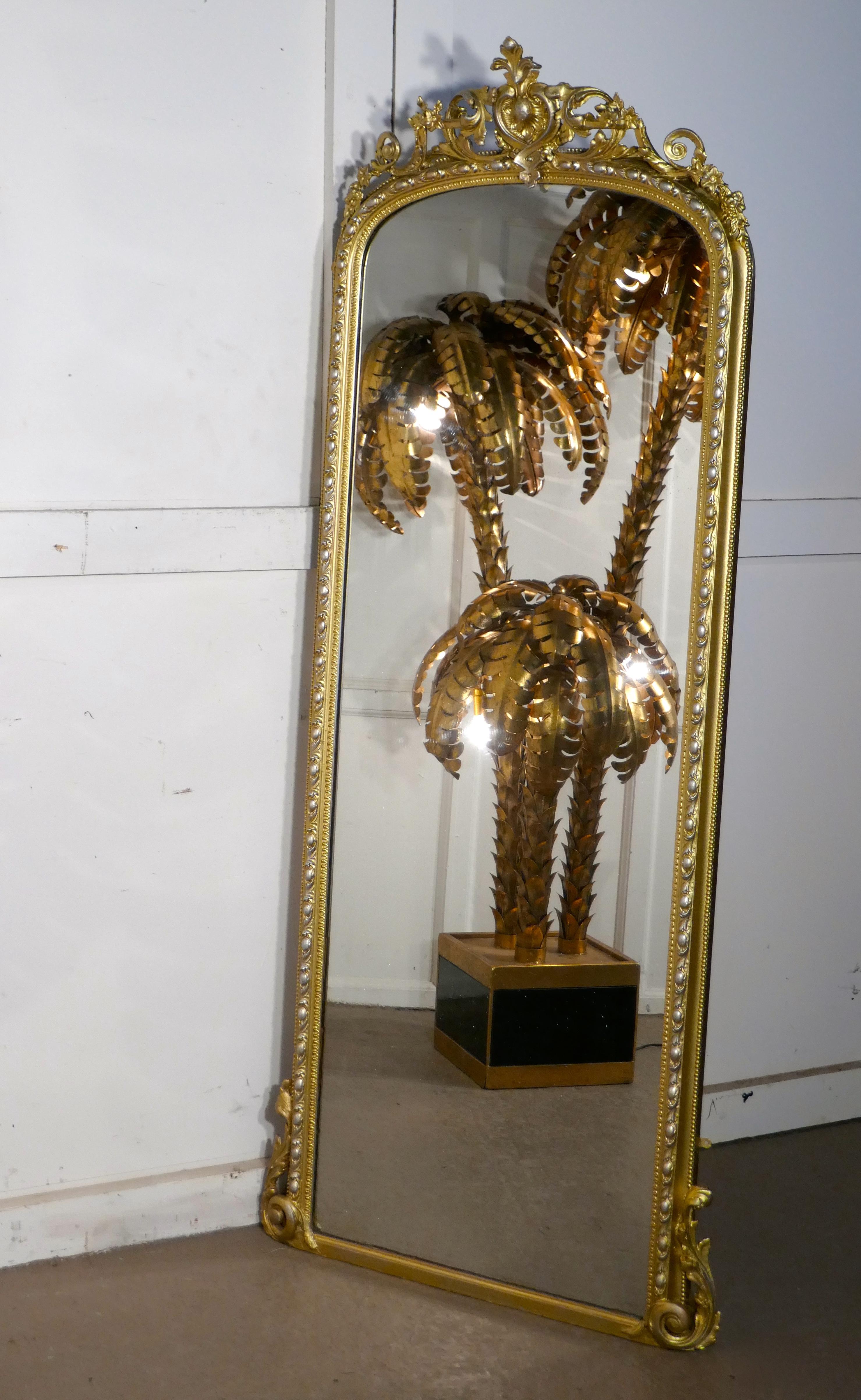 Tall French 19th century Louis Philippe wall mirror decorated in silver and gold
 
This is a magnificent statement piece and genuine 19th century french chic furnishing, the gold frame has a charming finish in gold with silver highlights, it is