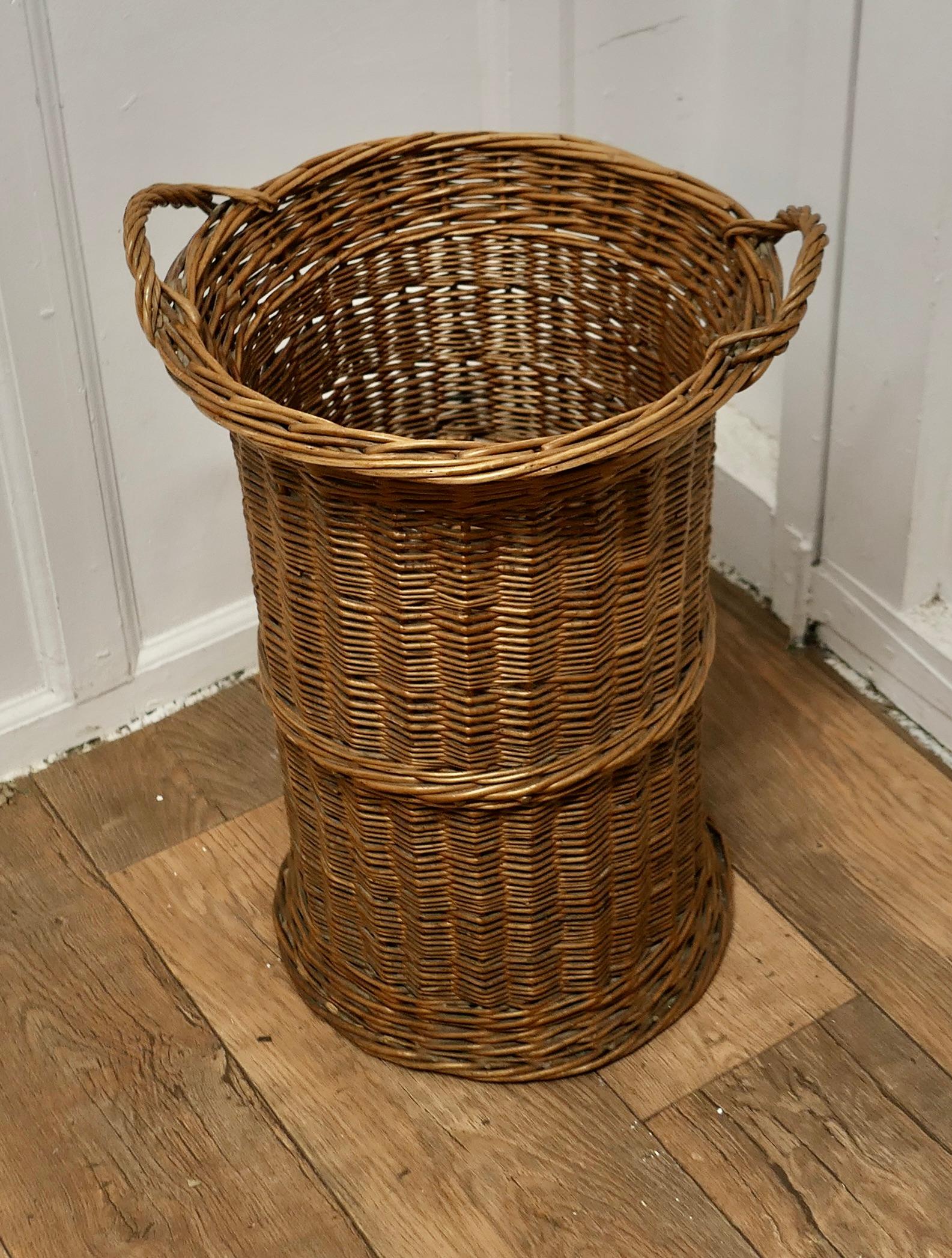 Tall French Antique Wicker Bread Basket

This is an excellent example and in remarkably good condition for its age, the basket is round, tall originally used in a bakery to transport French Bread. The basket has strong carrying handles and is woven