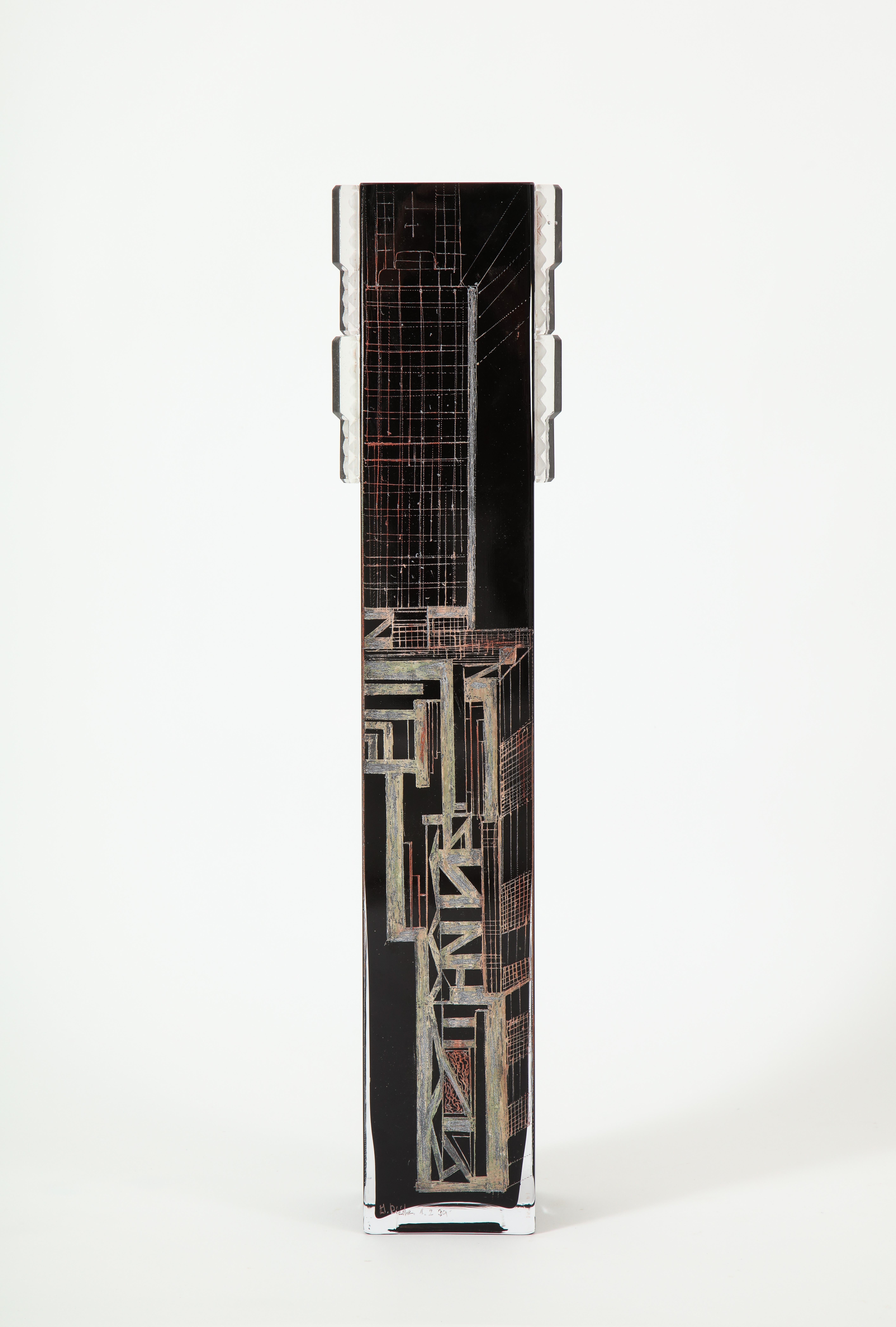 A tall black glass vase with abstracted geometric design in the Art Deco style with clear molded glass applications. Attr La Cupole Paris