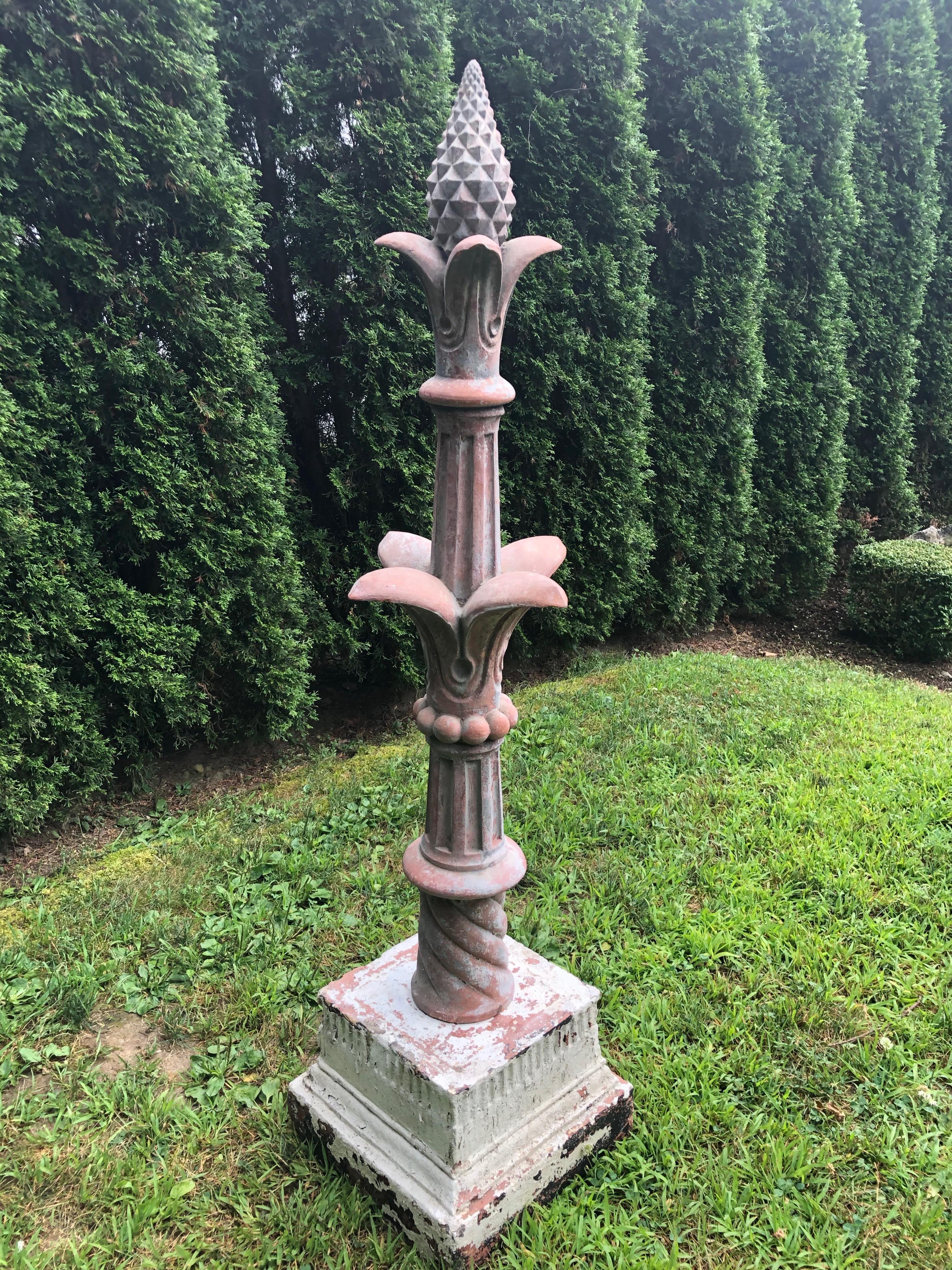 We’ve never seen any finial this tall, let alone such a stunning French one with 2 fleurs-de-lys and a detailed pineapple-form top. The beaded decoration near the bottom, combined with the fluted upright sections and barley-twist motif (near the