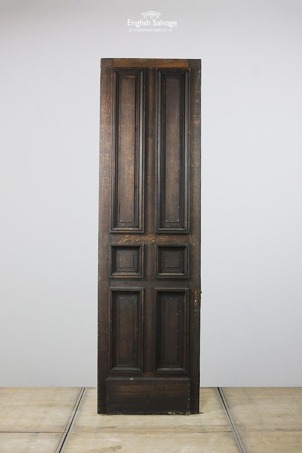 Reclaimed French oak door with six panels to the front and a plain boarded over back. Overall size below, the door has a 1cm lip to either side of the front of the door and the thickness of the door excluding the white block looking board is 4cm.