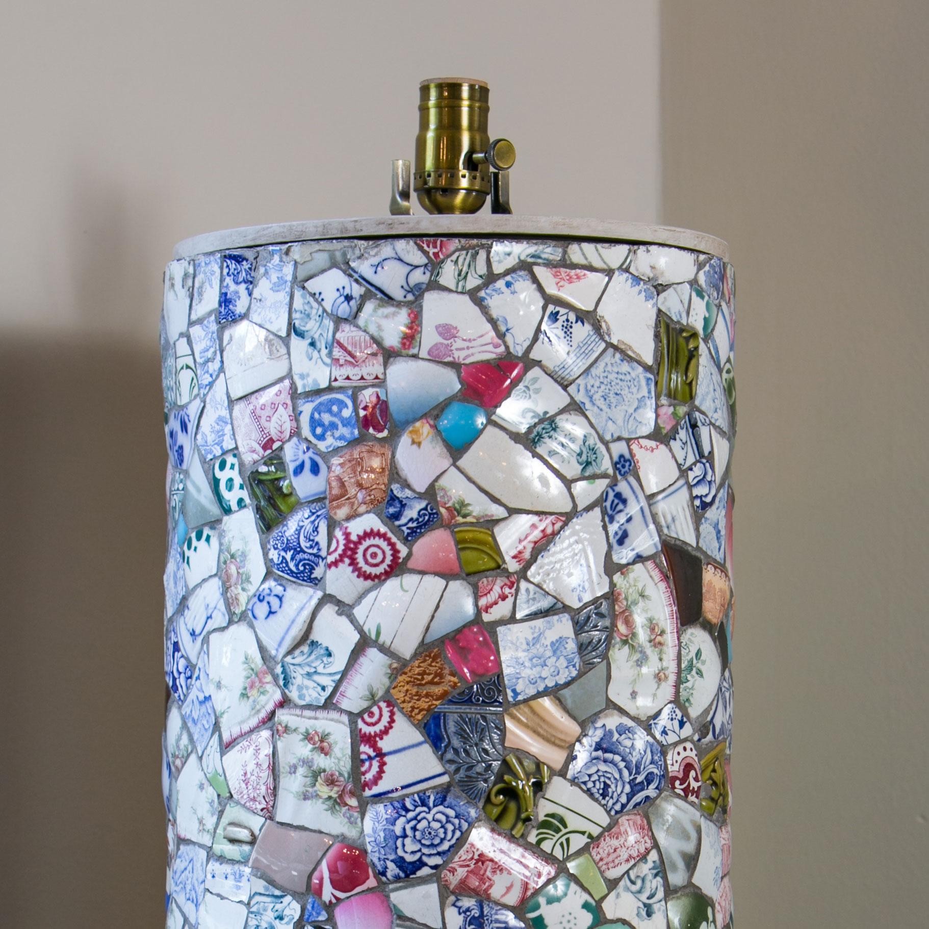 Tall charming mosaic lamp hand-made in France from pieces of vintage and antique china (circa 1940). This table lamp is hand-crafted in a type of mosaic work known as trencadis in Spain and as pique assiette, or 'thief of plates,' in France. This