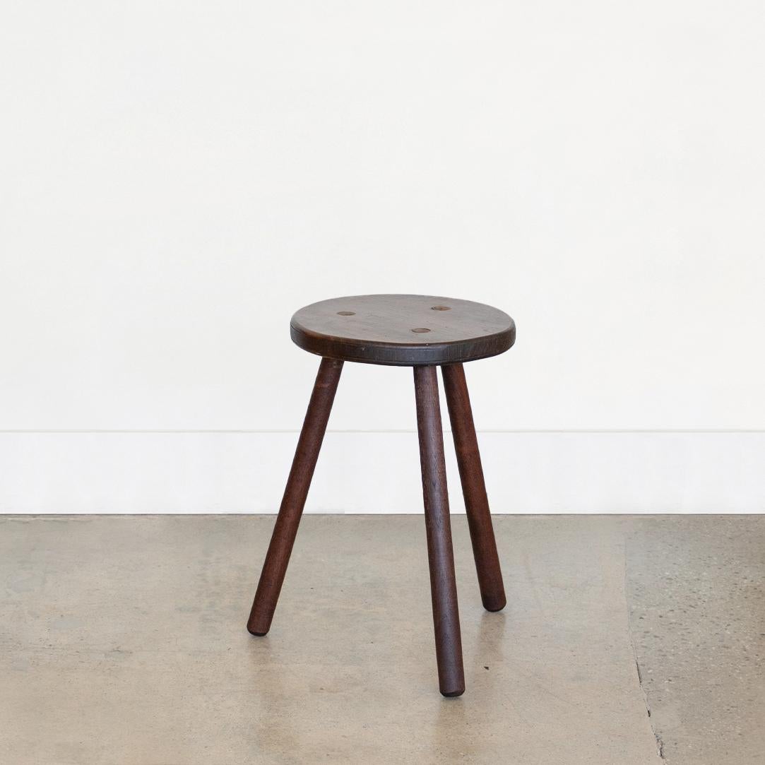Vintage tall wood stool with circular seat and tripod legs from France. Can be used as a stool or as side table.



