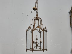 Tall French Wrought Iron Lantern with Glass Panels and Scroll Detailing - 1900s
