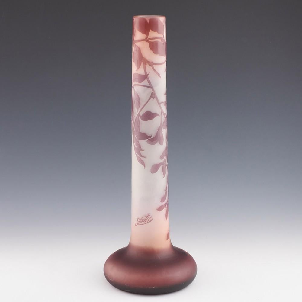 Heading : Tall Gallé magnolia vase
Date : c1910
Origin : Nancy, France
Bowl Features : Two colour cameo depicting magnolia
Marks : Galle cameo signed to body - this is a mark used between 1906 and 1914
Type : Lead
Size : 44.5cm height, 15.8cm