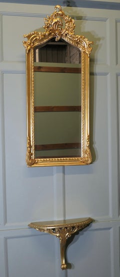 Tall Gilt Console Mirror with Shelf  This is a very lovely piece