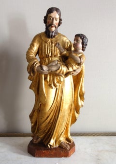 Tall gilt wood devotion of St Joseph and Child Jesus, late 17th century