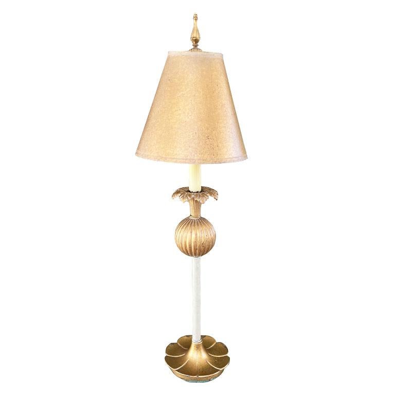 A tall Hollywood Regency or Art Nouveau table lamp with gold shade. This is a gorgeous tall lamp that will be eye-catching on any accent table, buffet, or side table. The base is created from a gold metal (possibly brass due to the patina that has