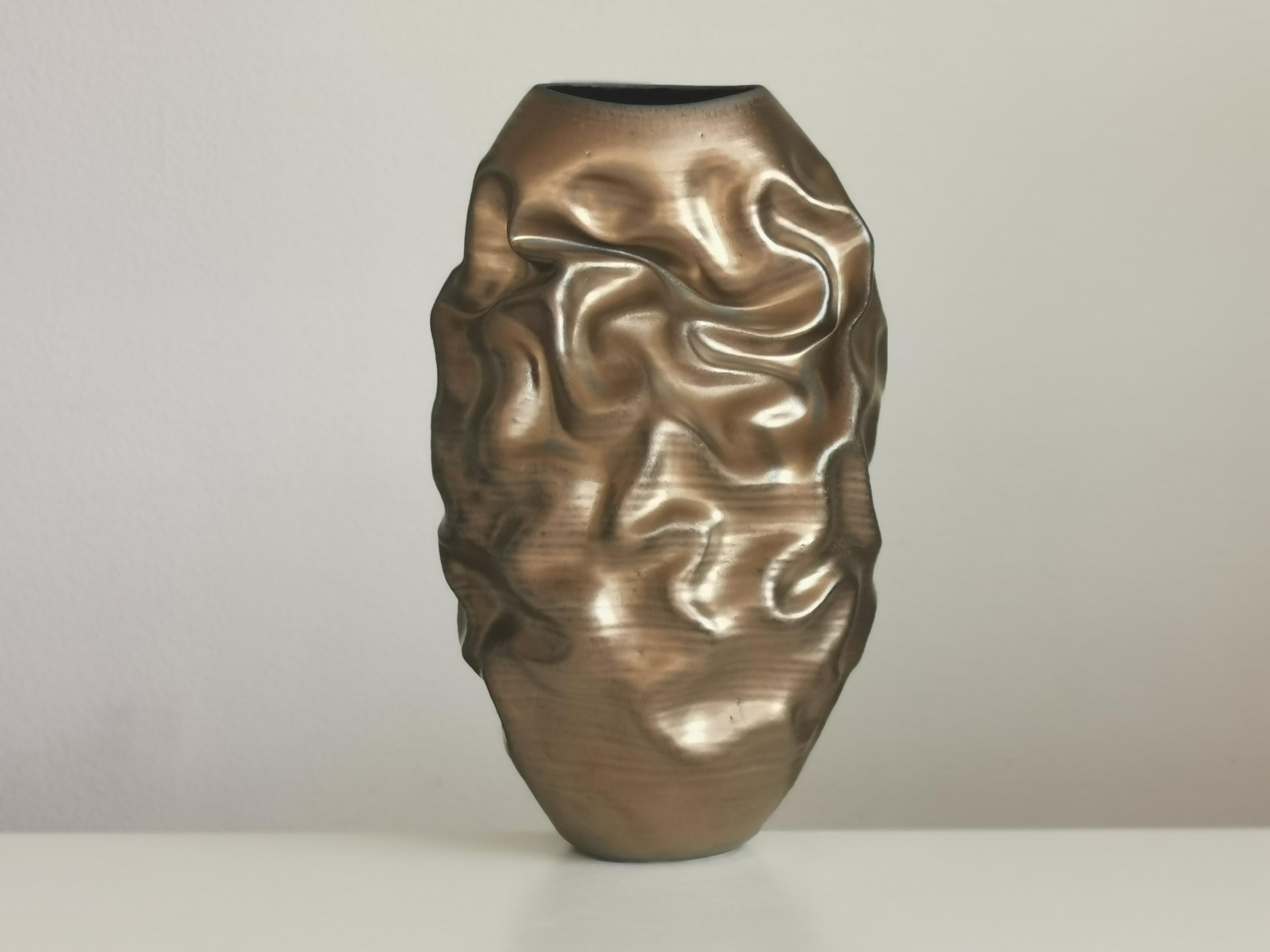 Sculpture vessel N.86. sumptuous ceramic sculpture from ceramic artist Nicholas Arroyave-Portela. Made in 2022.

White St.Thomas clay, stoneware glazes, multi fired to cone 6 (1223 degrees)

Measures: 44 cm tall, 24 cm wide, 22 cm deep

The