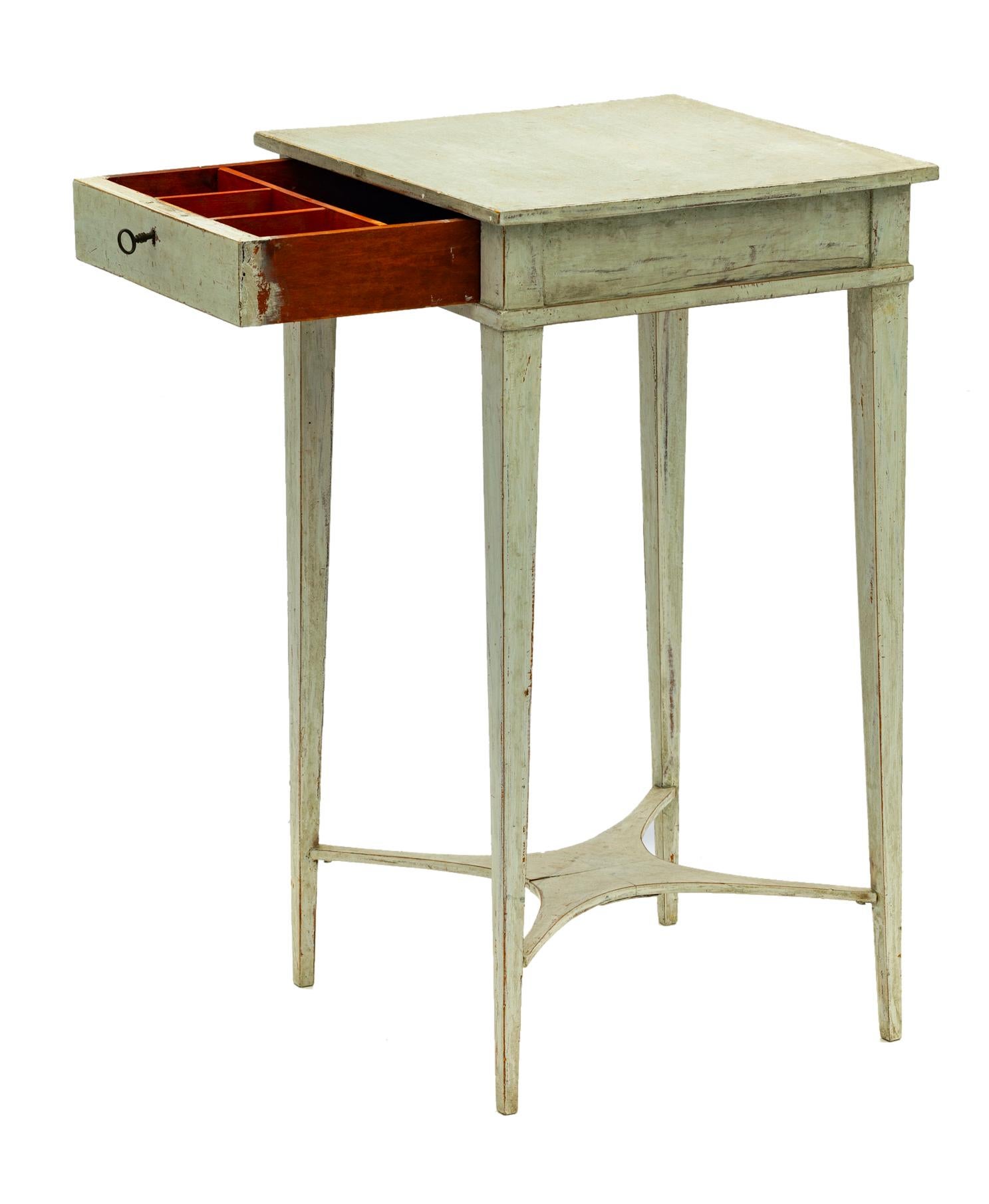 Tall & Slender nightstand with a secure drawer with original lock & key.
The small drawer has 3 small compartments & 1 larger space behind.
Made of hand painted hardwood. Interesting details such as the splayed bottom support.
This side table with a