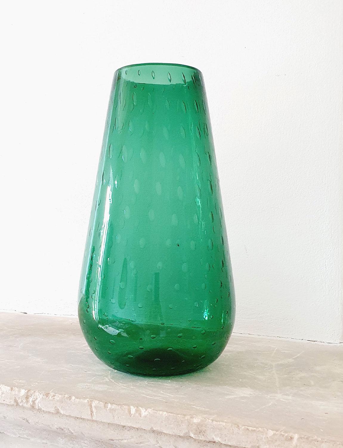 1970s Elegant Dark Green hand-blown Italian vase with bolle (bubbles) throughout. There is the mark on the base where the molten glass has been cut from the blow pipe evidencing it's hand-blown nature. Found here in Italy and in good condition.
