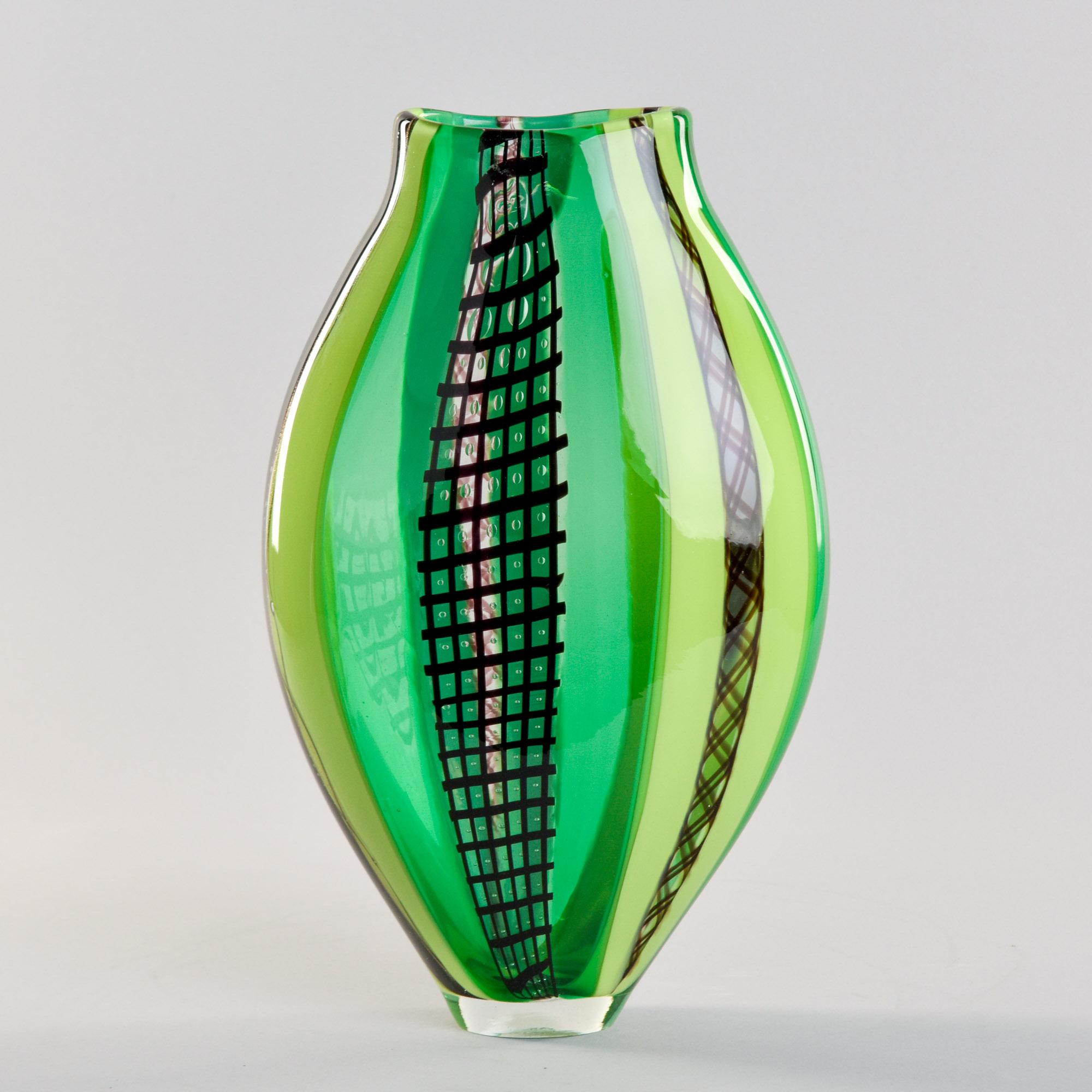 Found in Italy, this vibrant Murano glass vase dates from the late 1990s, early 2000s. Tall ovoid shape in various shades of green with clear and black accents. Vase has etched Fabiano Zanchi signature on underside of base. Zanchi is a Murano glass