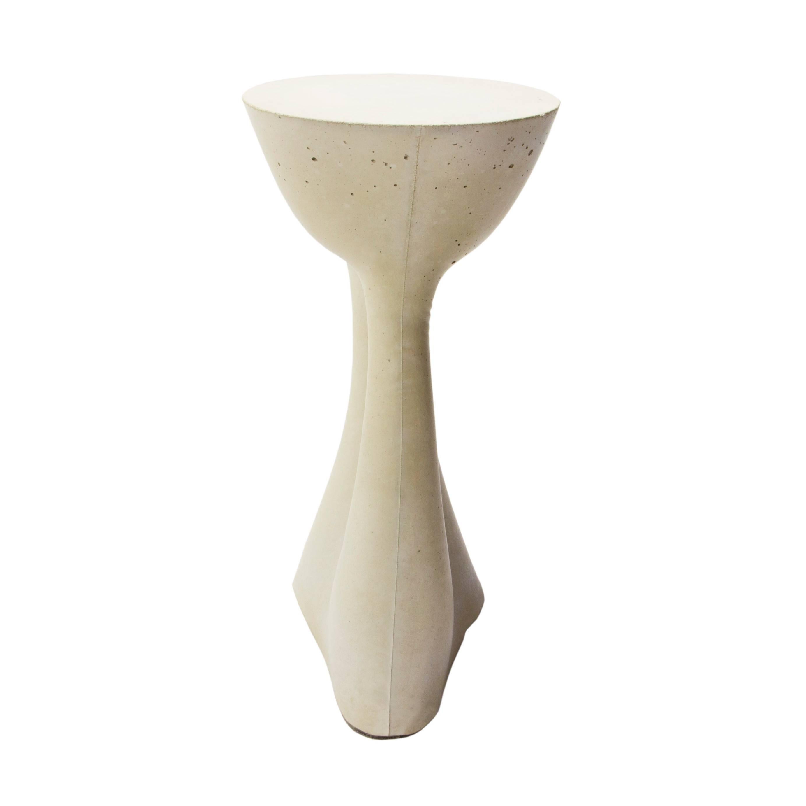 Industrial, organic and sculptural, the Kreten side tables are concrete furniture like you haven’t seen before. Original pieces are created in Souda's Brooklyn studio by casting concrete into a spandex mold. The unique material combination delivers