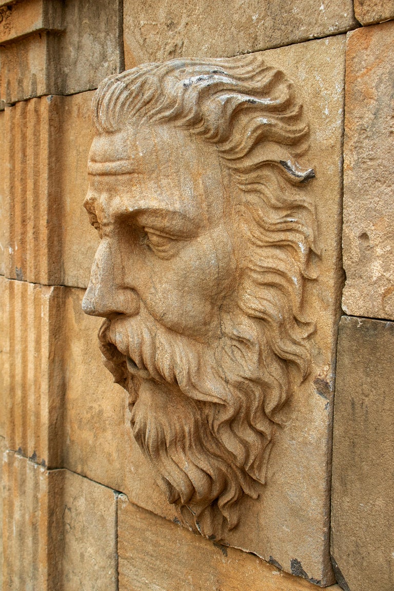 Tall Hand Carved Stone Wall Fountain with Aged Patina at 1stDibs