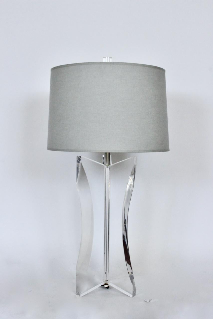 Herbert Ritts for Astrolite Transparent Acrylic Triform Fin table lamp, 1970's.
Featuring three large, sturdy, smooth, thick attached, clear Lucite fin panels, Chrome plated neck, original clear Acrylic finial. Standard socket. 23H to top of