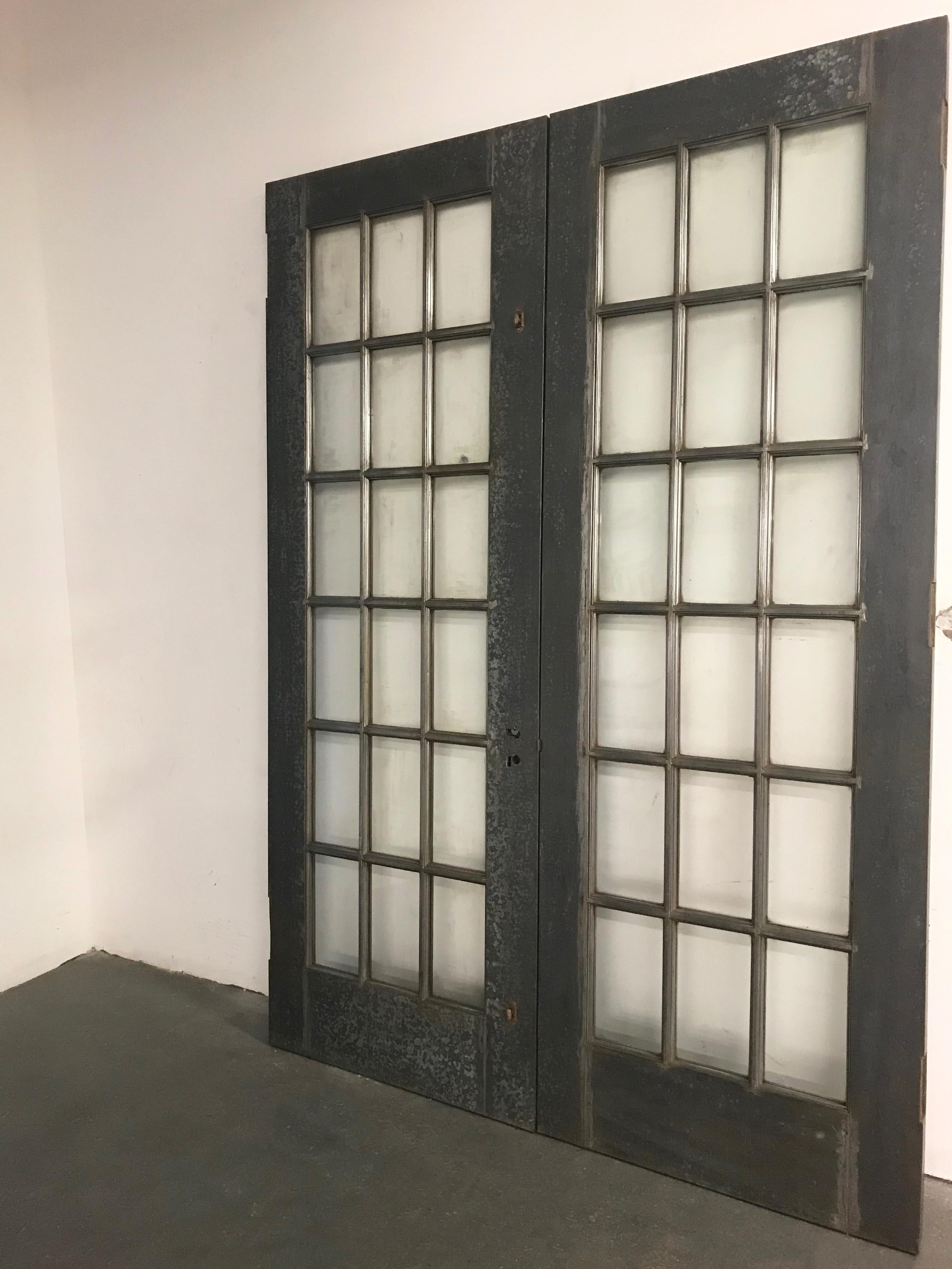 Tall Industrial Brushed Steel and Glass Doors 1