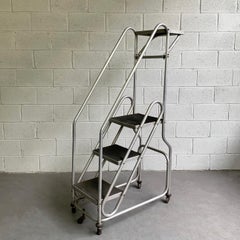 Tall Industrial Machine-Age Rolling Aluminum Ladder