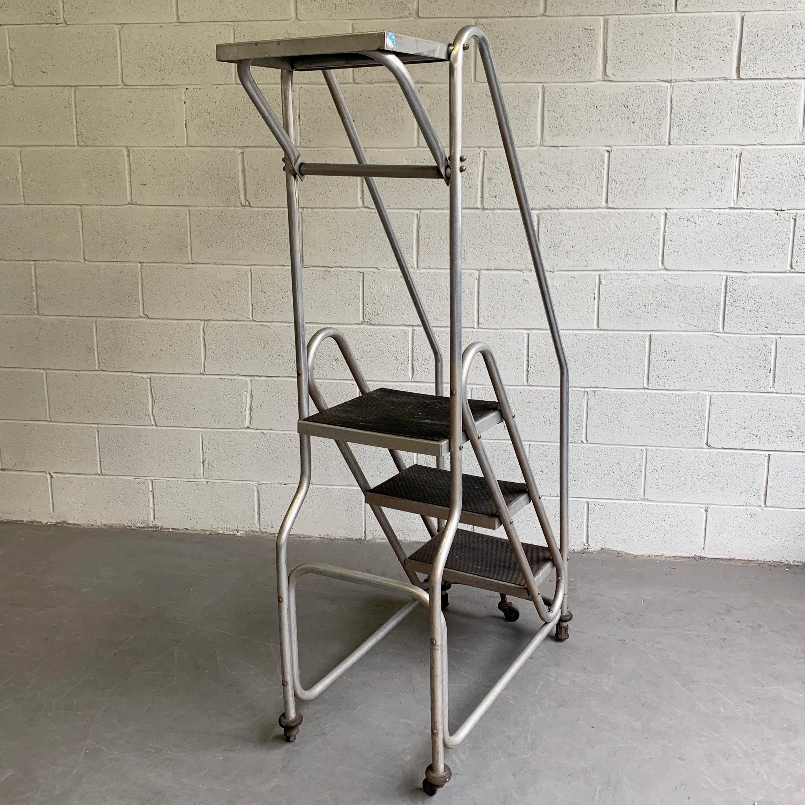 20th Century Tall Industrial Machine-Age Rolling Aluminum Ladder