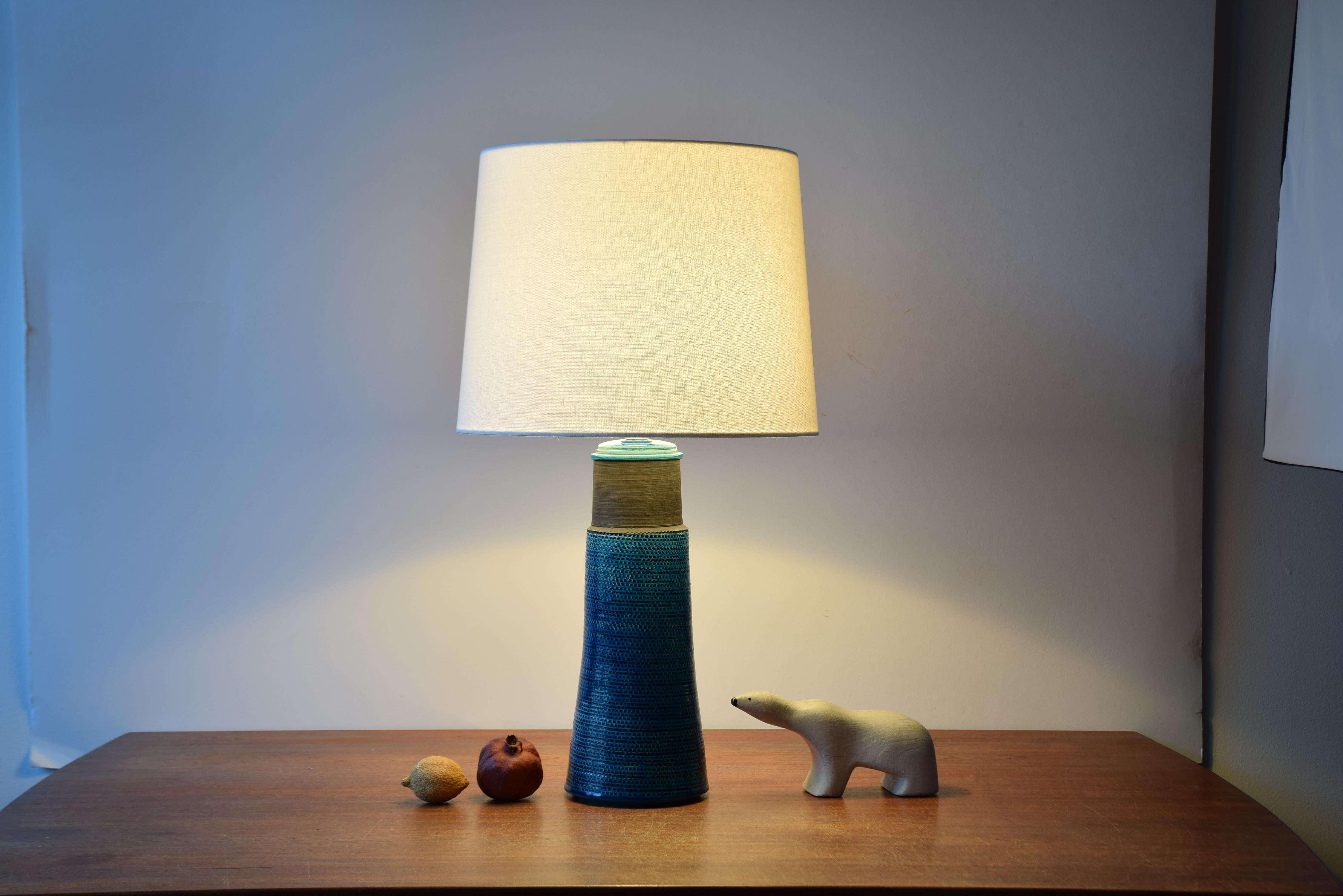 Tall table lamp designed by Nils Kähler and made by Herman August Kähler´s ceramic workshop in Denmark in the 1960´s

Nils Kähler (1906-1979) was fourth generation of the family Kähler. He and his brother Herman Jørgen Kähler, who were in charge