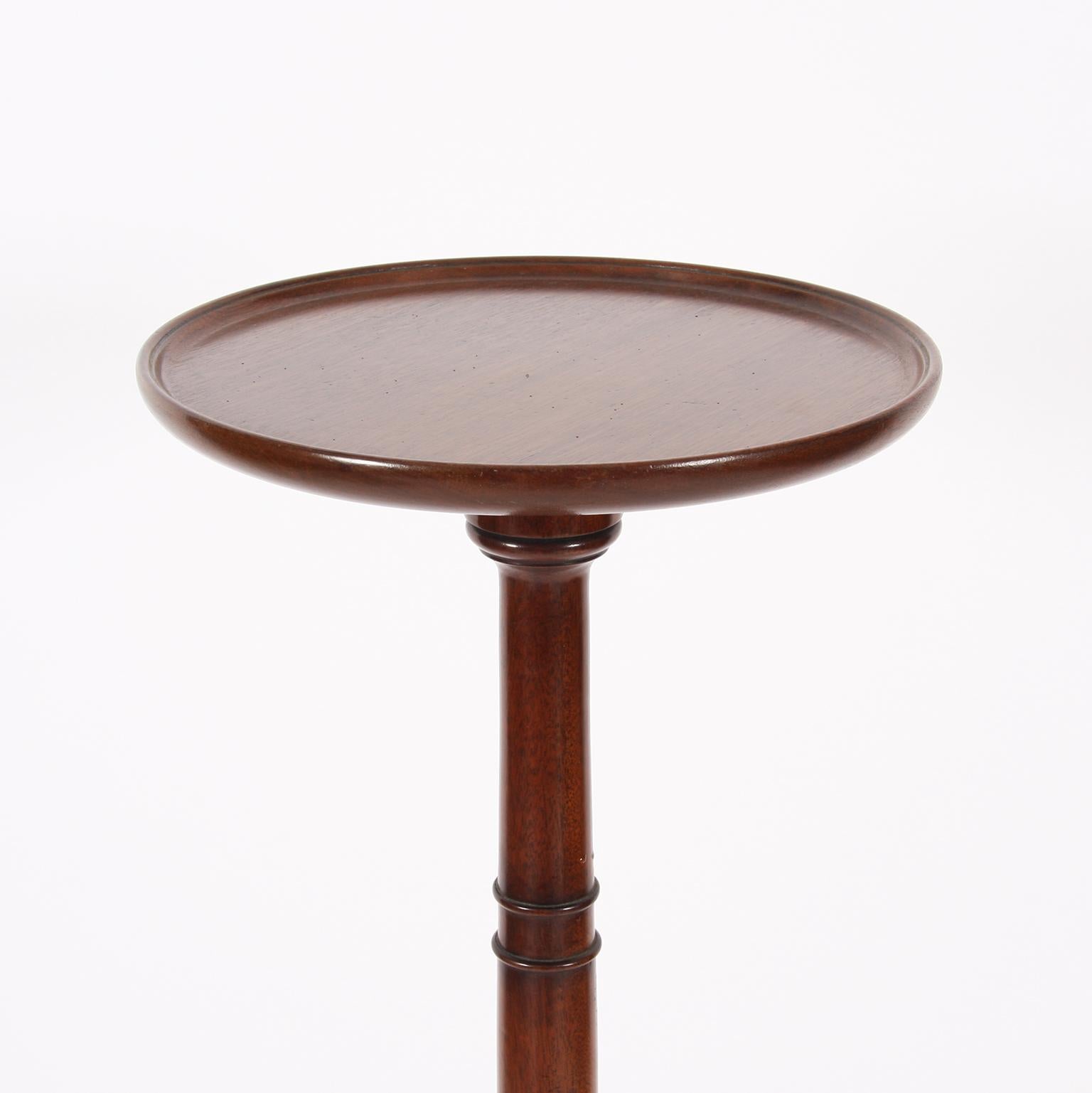 English, early 20th century

A tall, mahogany, lamp table, with elegant brass feet and castors. 

The width/depth measurement refer to the three legs.