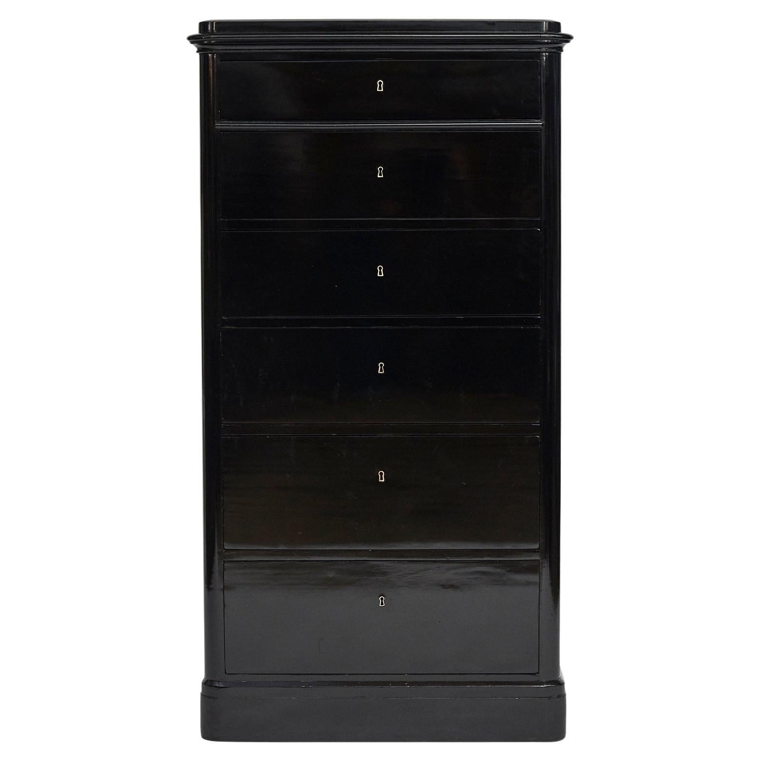 Tall Late Empire Ebonized Chest of Drawers
