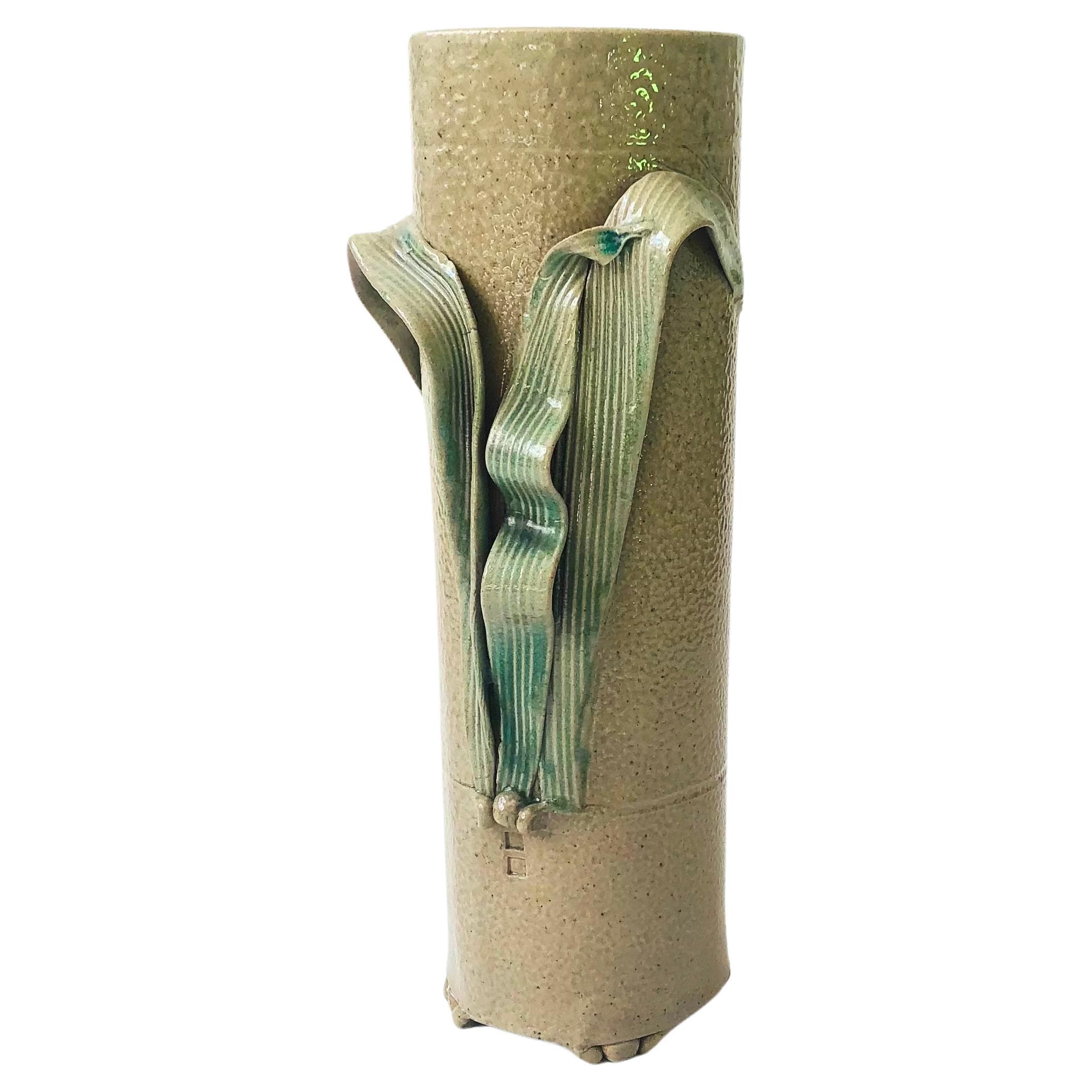 Vaso alto in ceramica a forma di foglia