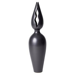 Tall Lily Vase, a Black / Ebony Sculptural Porcelain Vase by Vivienne Foley