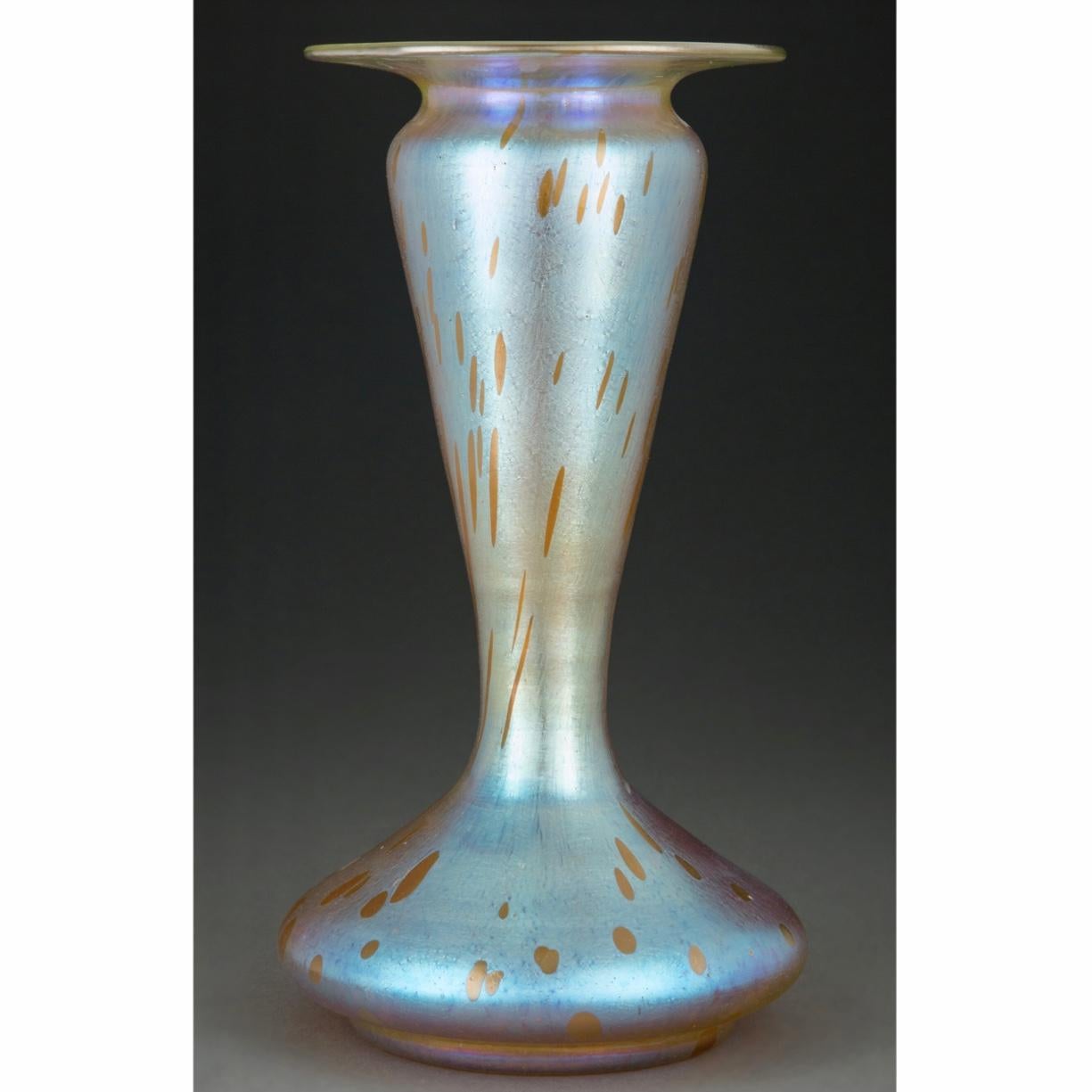 Tall Loetz Candia Astraea glass vase, circa 1900 

I have been collecting art glass for 35 years including large amounts of Louis Comfort Tiffany, Daum, Galle etc. and to this day; I strongly believe Loetz to be the most beautiful of them all. This