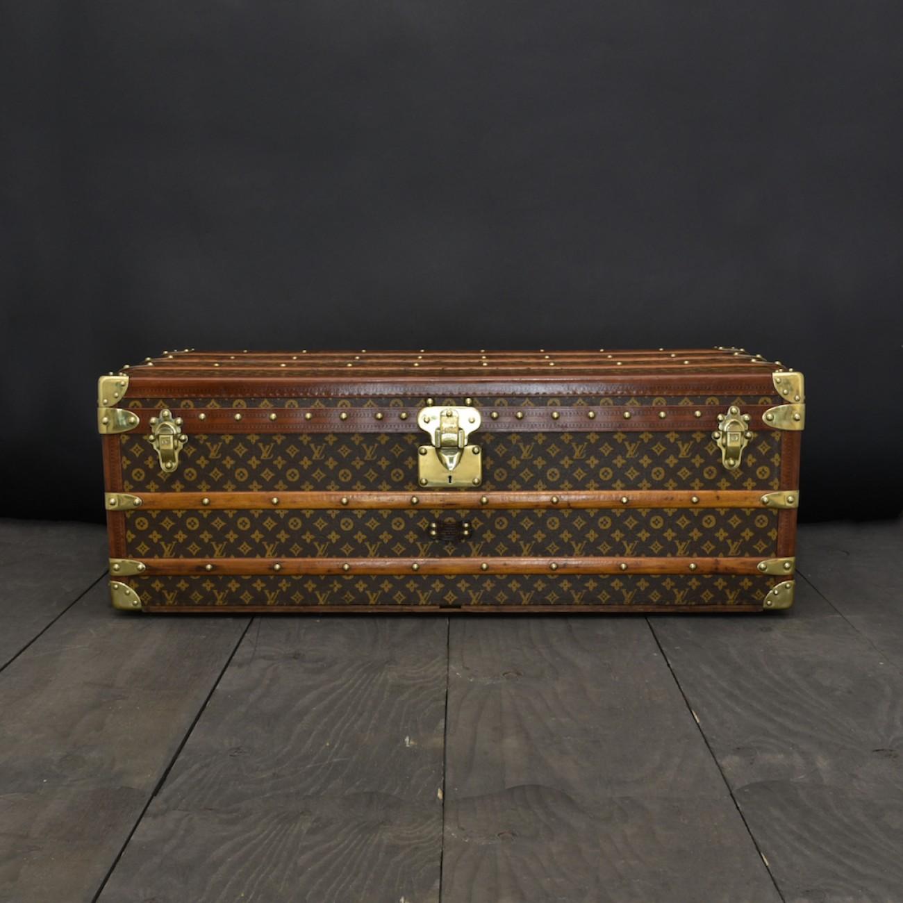 A wonderful brass bound Louis Vuitton monogram cabin trunk that is taller than usual and would be the perfect coffee table. The trunk is in excellent condition and comes complete with its original interior and polished brass fittings. The newly made