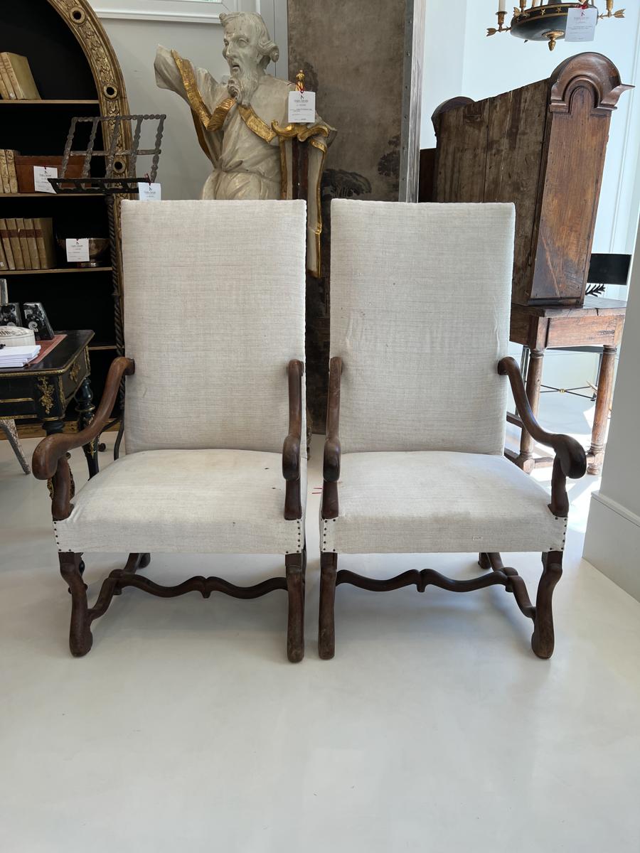 Matching pair of Louis XIV Osmouton Fauteuils with French Fabric.  