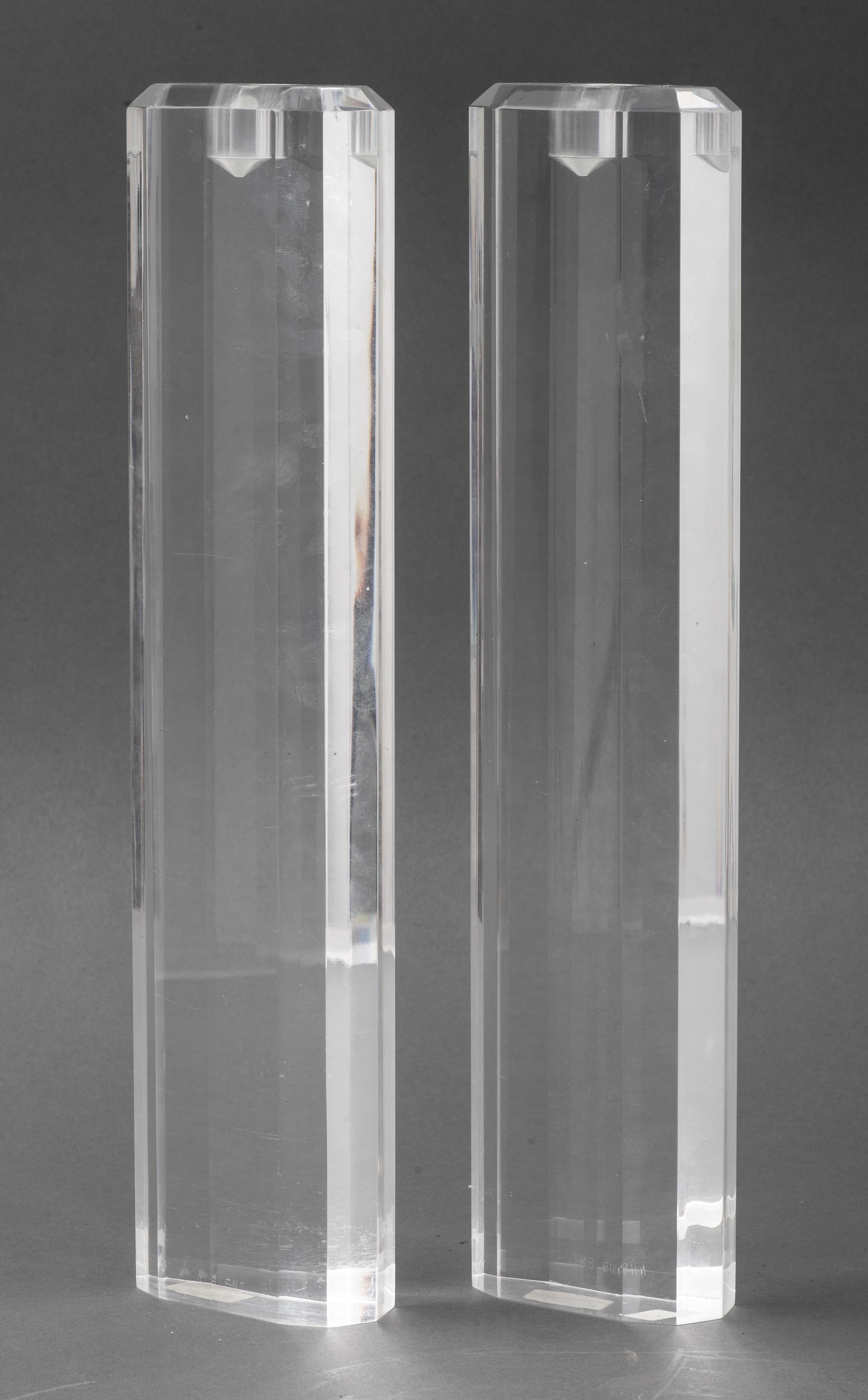 Pair of tall lucite candlesticks, marked 