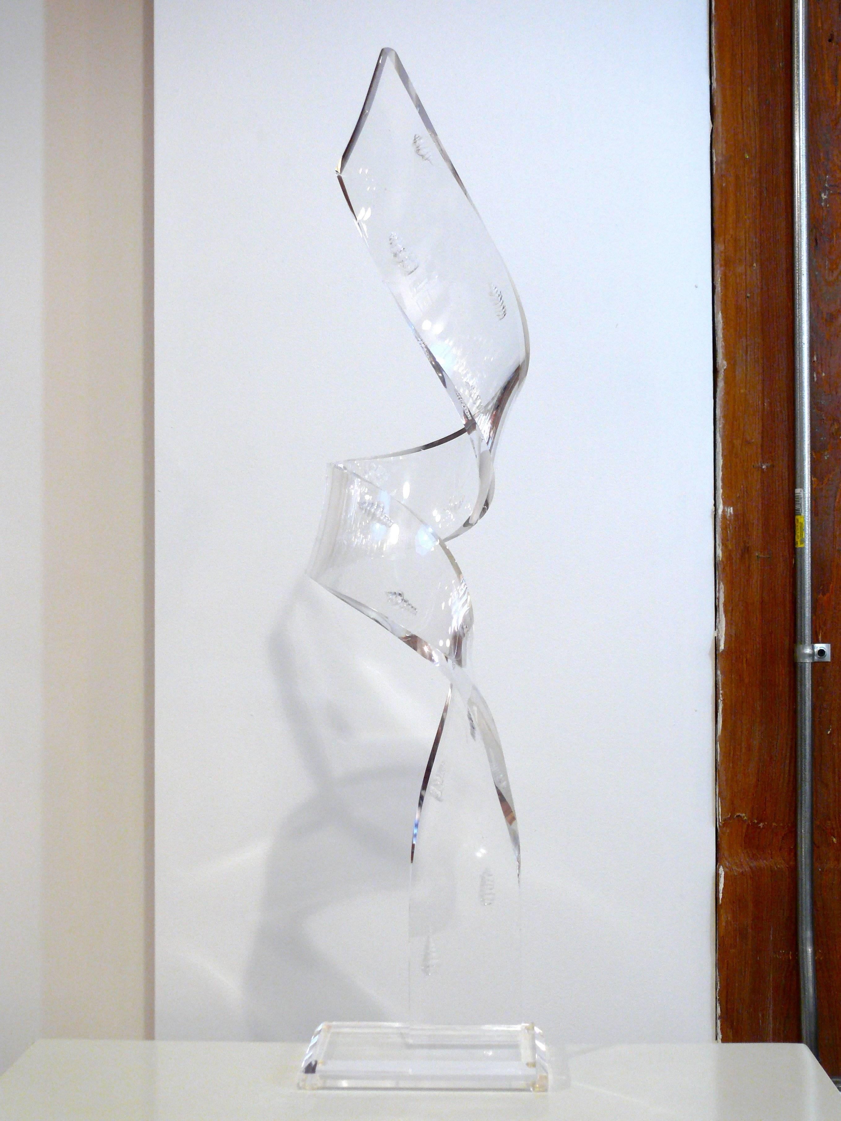 Tall Lucite sculpture with shells carved into the Lucite, measure: 29.75
