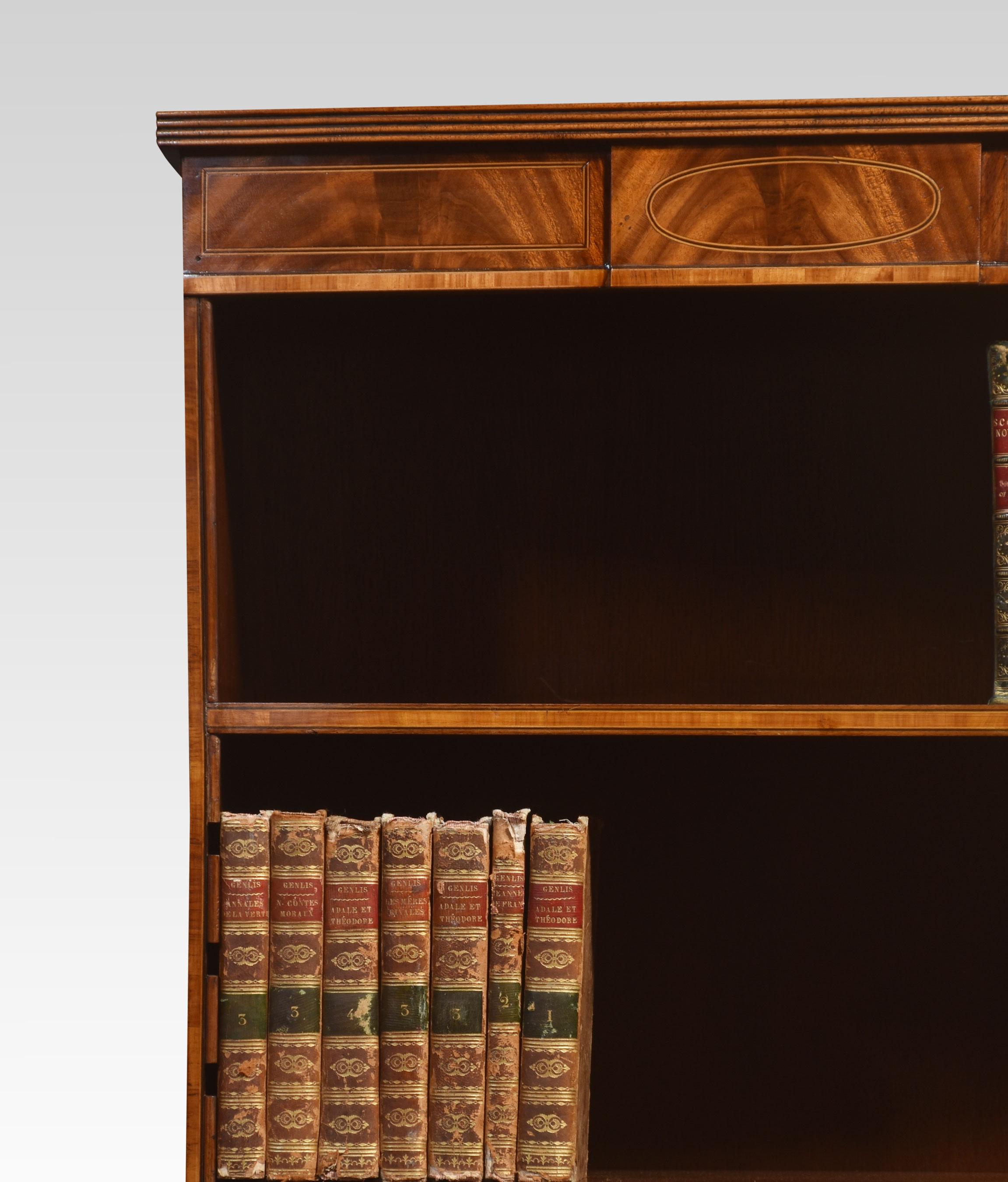 British Tall mahogany inlaid open bookcase For Sale