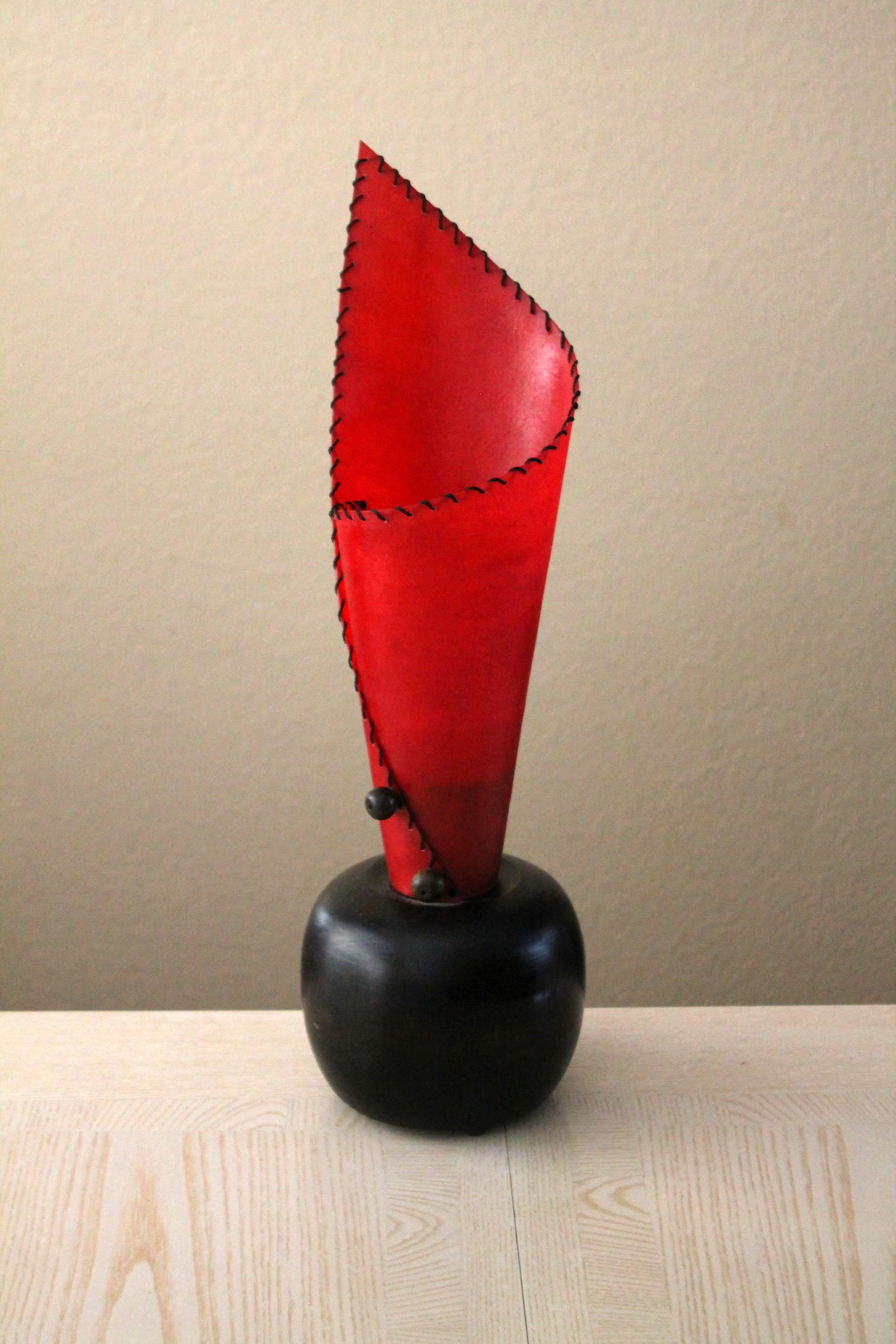 Marvelous!

Fabulous Eighties Post Modern
Conical Fiberglass Table Lamp!

In the manner of Ettore Sottsass


This tall and ultra red fiberglass lamp is a fabulous artifact of the 1980s post-modern movement. It's striking at first glance but it keeps