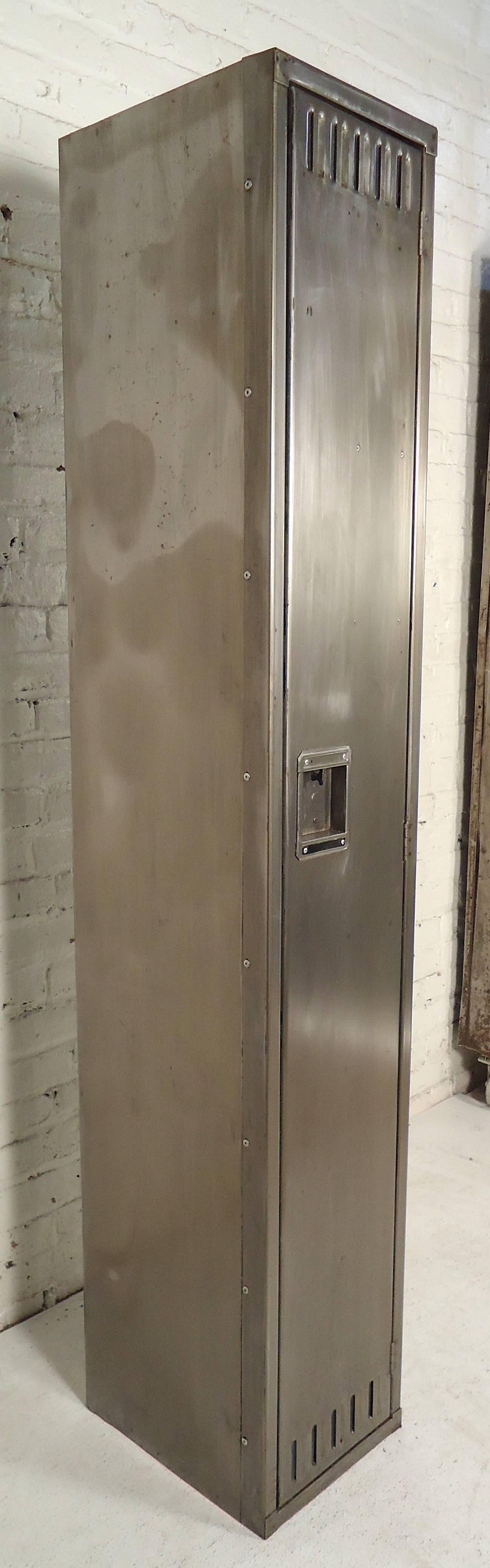 Vintage metal locker restored in a bare metal style finish. Inside is painted black with shelf and coat hooks.

(Please confirm item location - NY or NJ - with dealer).
 