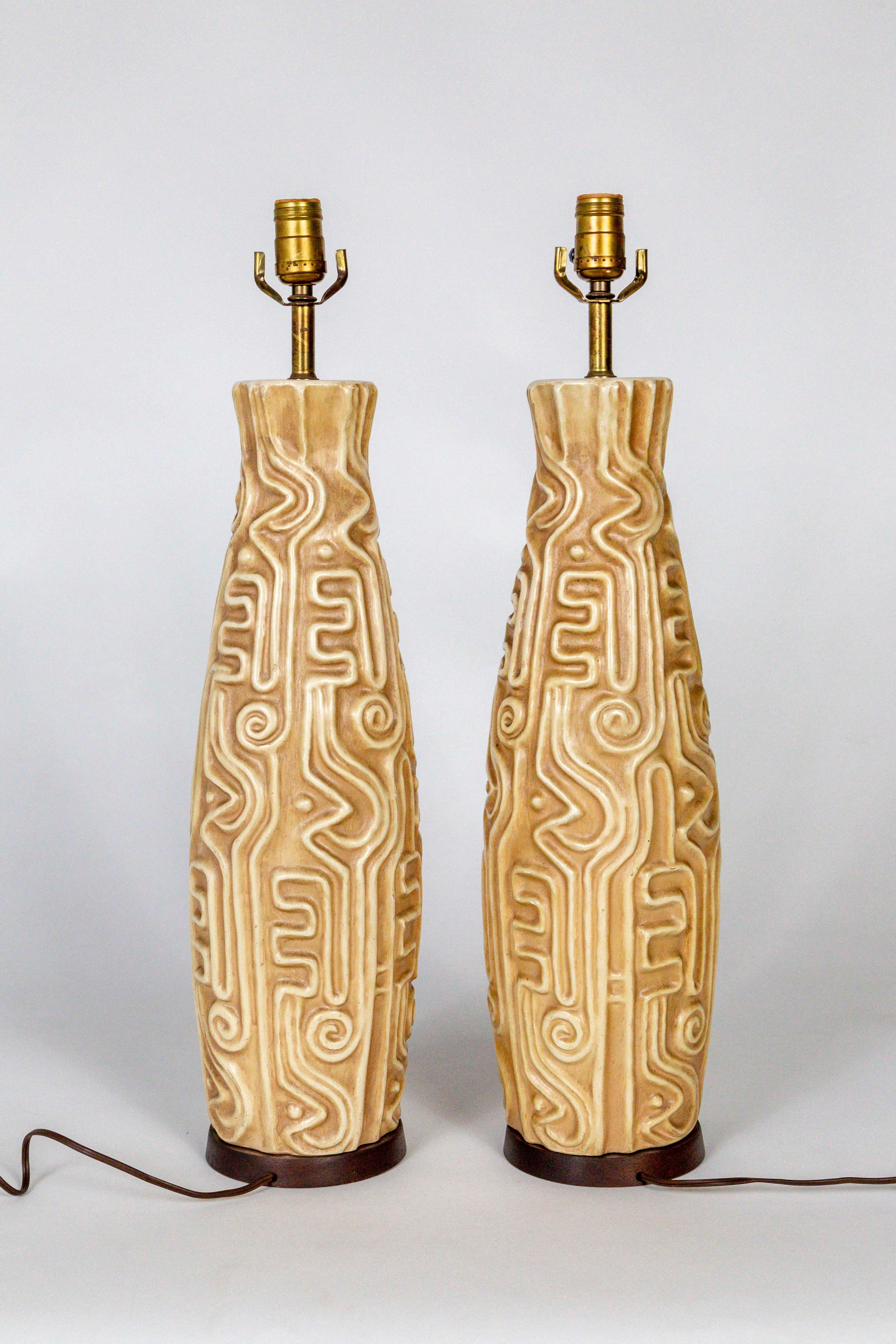 North American Tall Midcentury High Relief Carved Tan Pottery Lamps 'Pair'