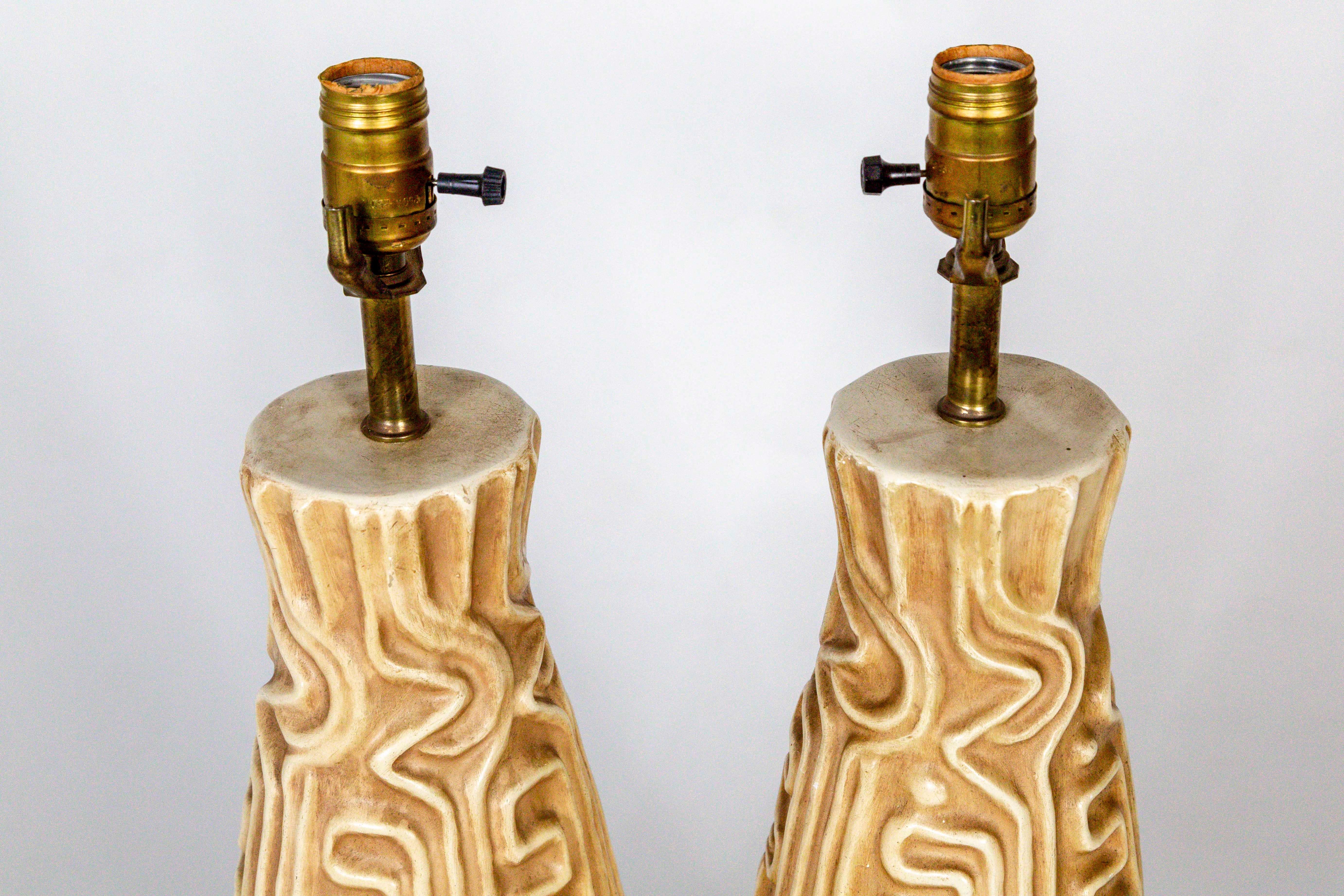 Tall Midcentury High Relief Carved Tan Pottery Lamps 'Pair' In Good Condition In San Francisco, CA