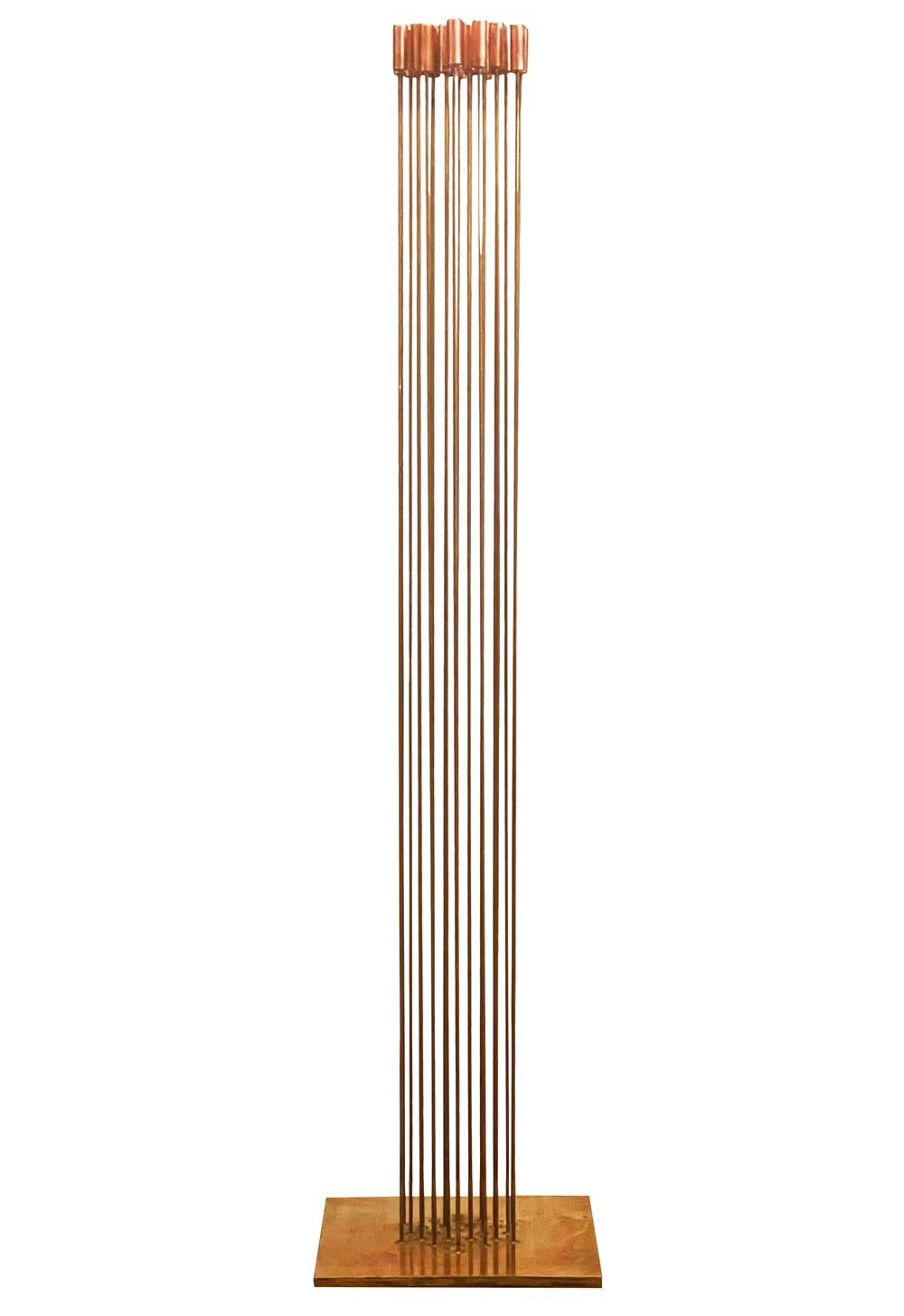 A stunning tall sound sculpture made by Val Bertoia. Makes a beautiful chime when played. Comprised of brass and beryllium copper. Stamped and numbered with COA from Bertoia Studio.