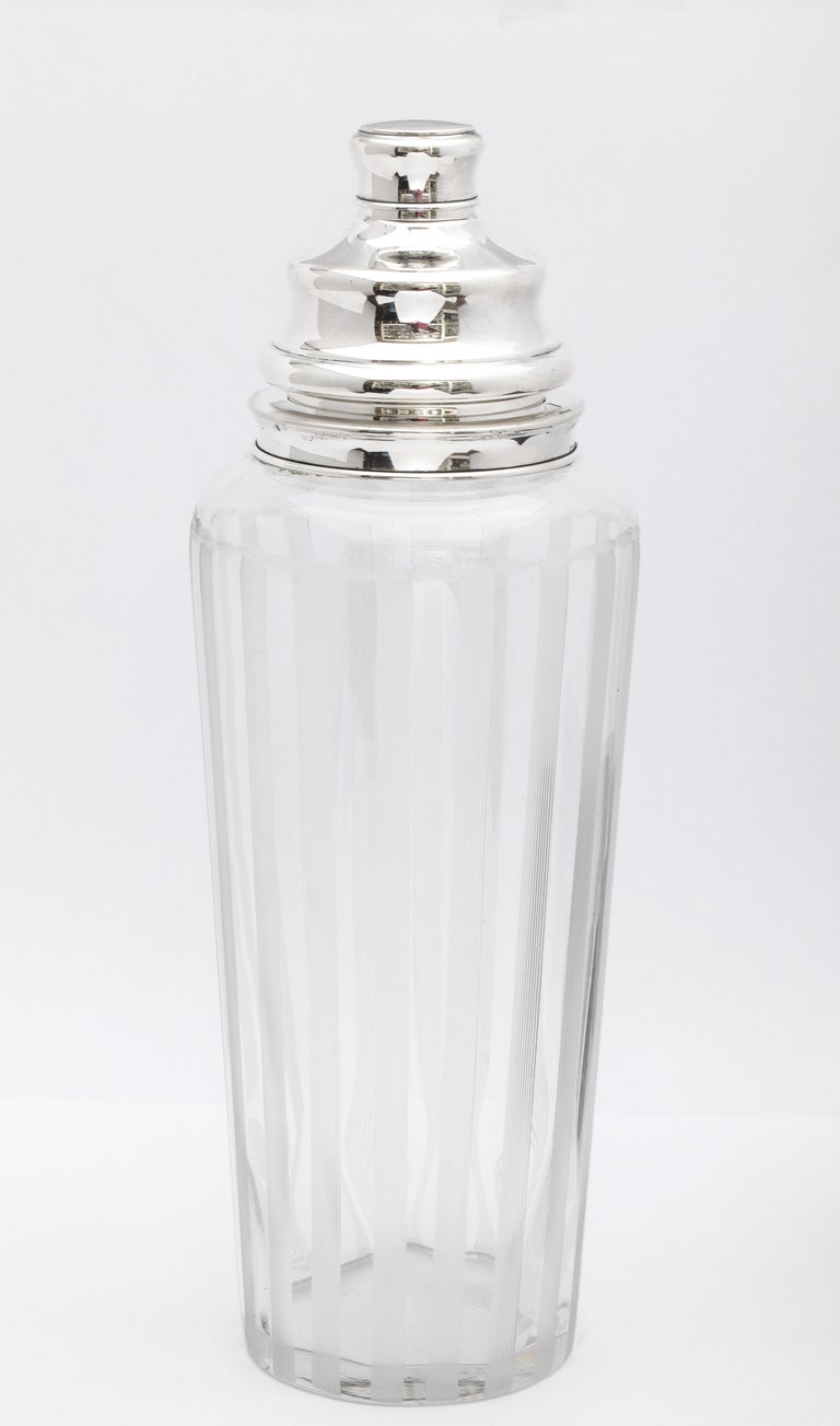 Mid-Century Modern, very tall, sterling silver-mounted tuxedo-stripe-etched glass cocktail shaker, T.G. Hawkes and Co. makers, New York, ca. 1950's. Measures 13 inches high (to top of lid) x 4 1/2 inches diameter (at widest point). Shaker itself is