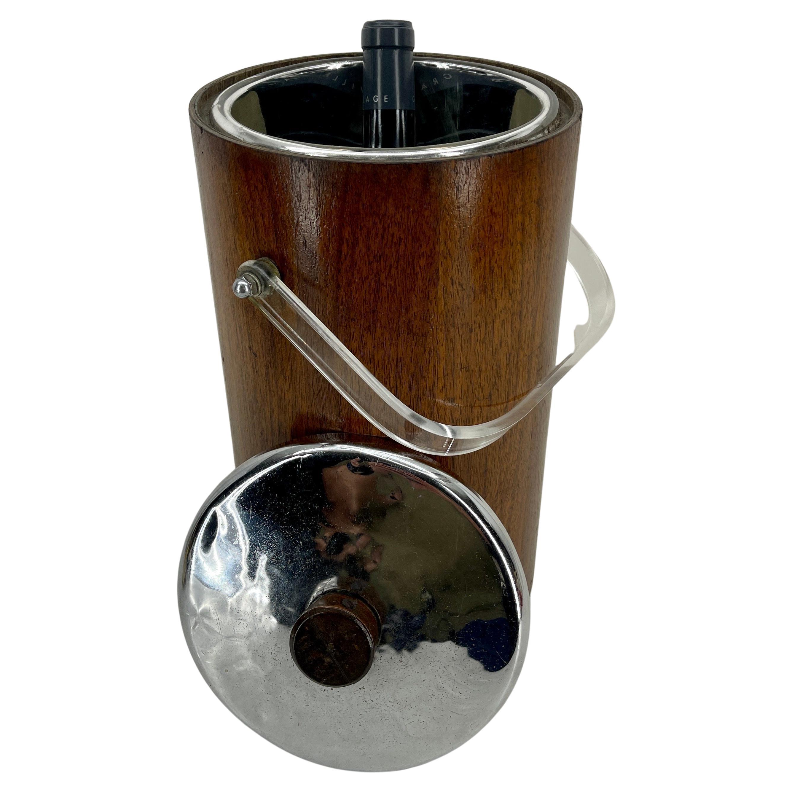 America Mid-Century Ice Bucket in Teak and Chrome Lid with Thermos Liner and Lucite Handle 
 A very tall ice bucket by The American Thermos Bottle Company from the 1960s. 