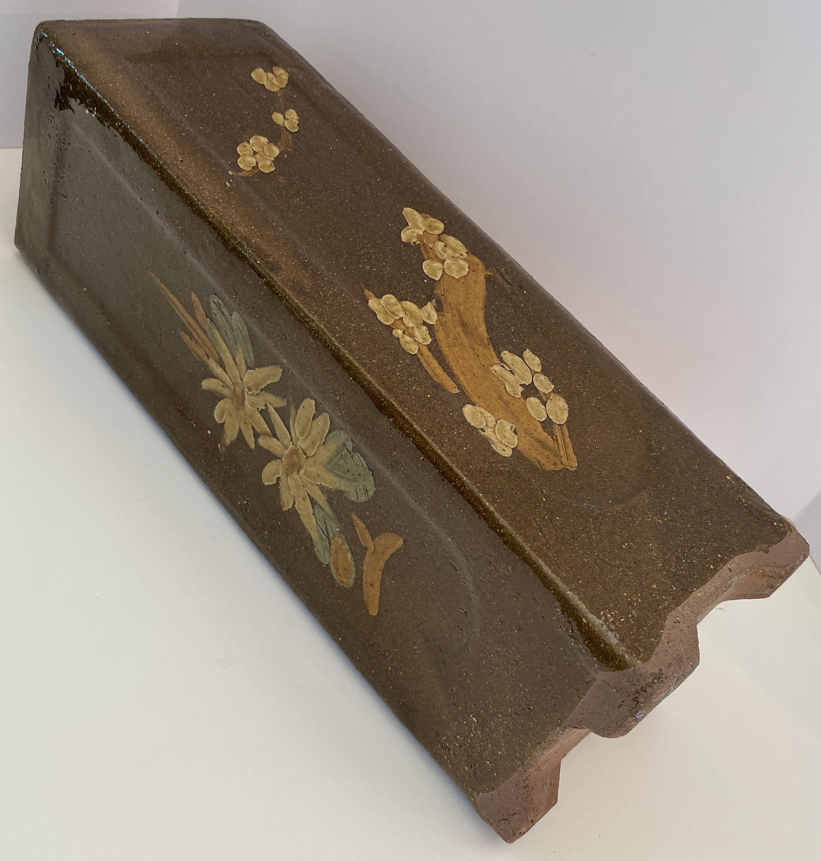 Tall mid-century earthenware vase or planter. 
Glazed antique Chinese garden planter. 
 
This large vase or planter is decorated with flowers. The subdued green and brown hues makes it perfect for a variety of antique or contemporary themed