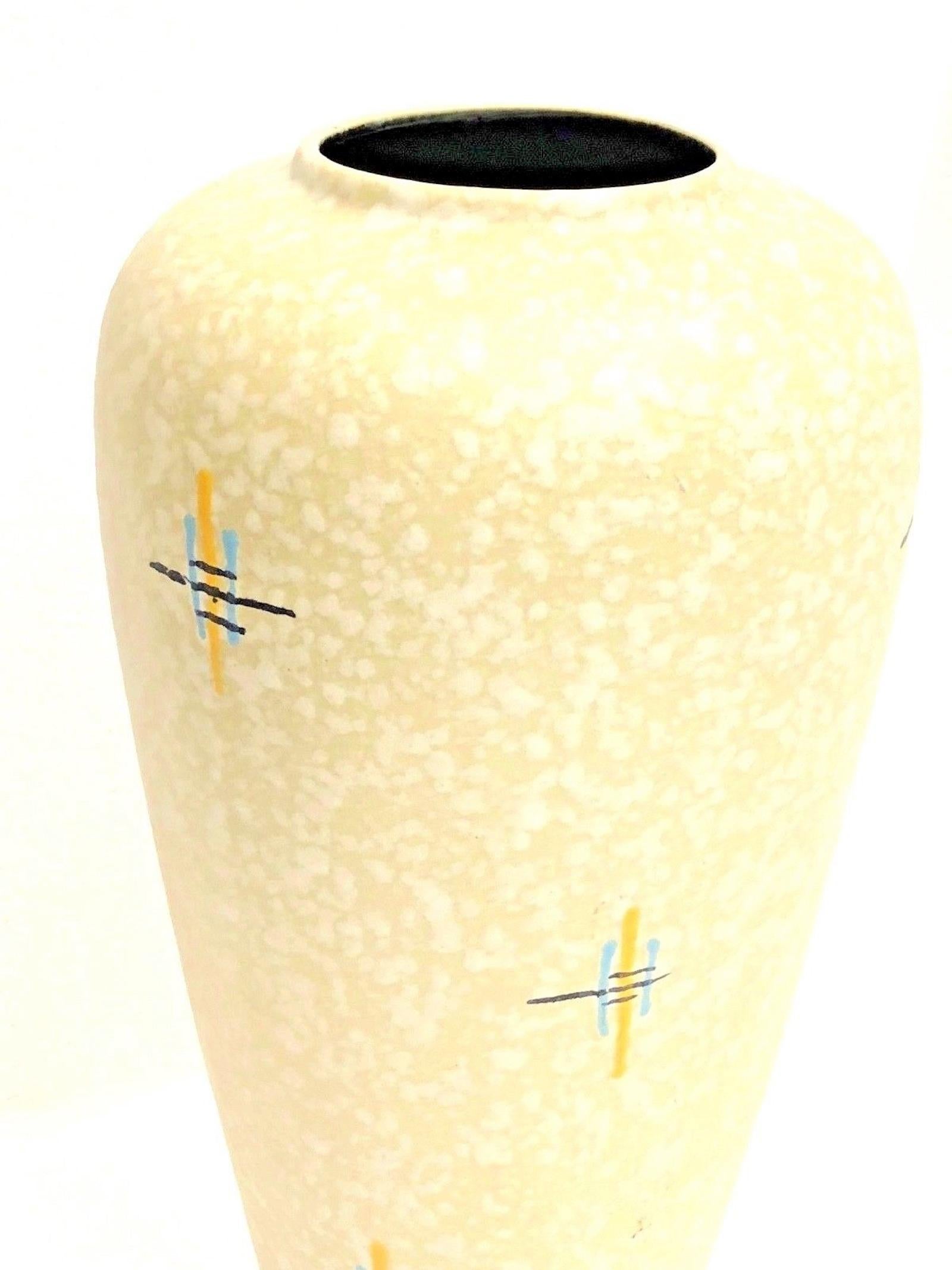 An amazing crack glazed ceramic Mid-Century Modern floor vase made in Germany, circa 1950s. This is a heavy floor vase but you can also use it as a umbrella stand. Vase is in very good condition with no chips, cracks, or flea bites. Made by